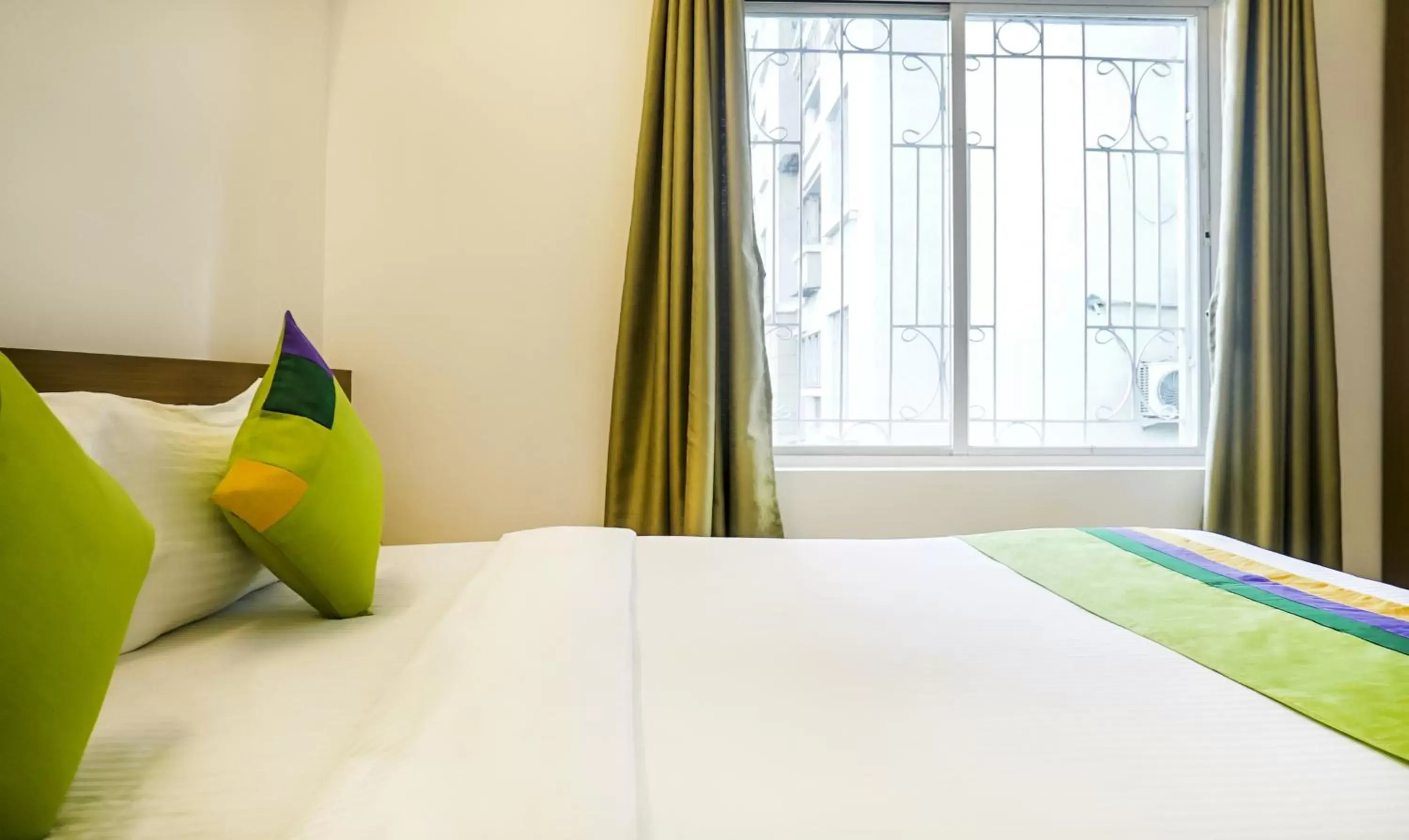 Bed in Treebo Luxe Suite, Shivaji Nagar Bed in Treebo Luxe Suite, Shivaji Nagar