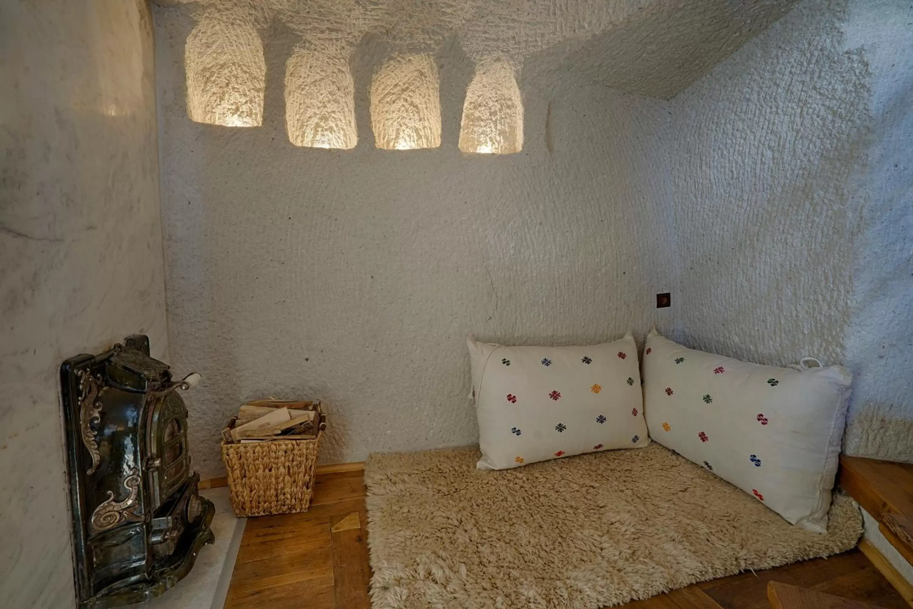 Seating area, Bed in Artemis Cave Suites & Spa- Adults Only Seating area, Bed in Artemis Cave Suites & Spa- Adults Only