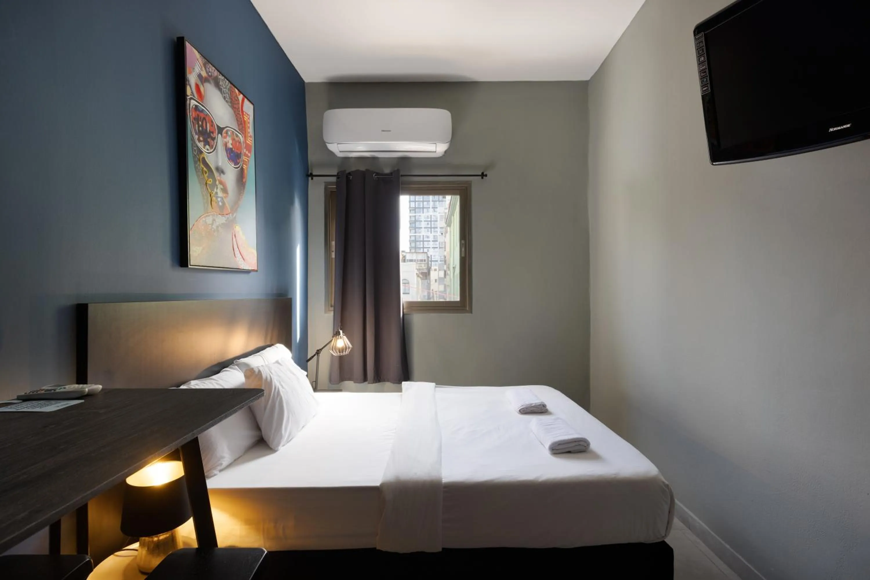 Bed in Liber Tel Aviv Sea Shore Suites BY RAPHAEL HOTELS