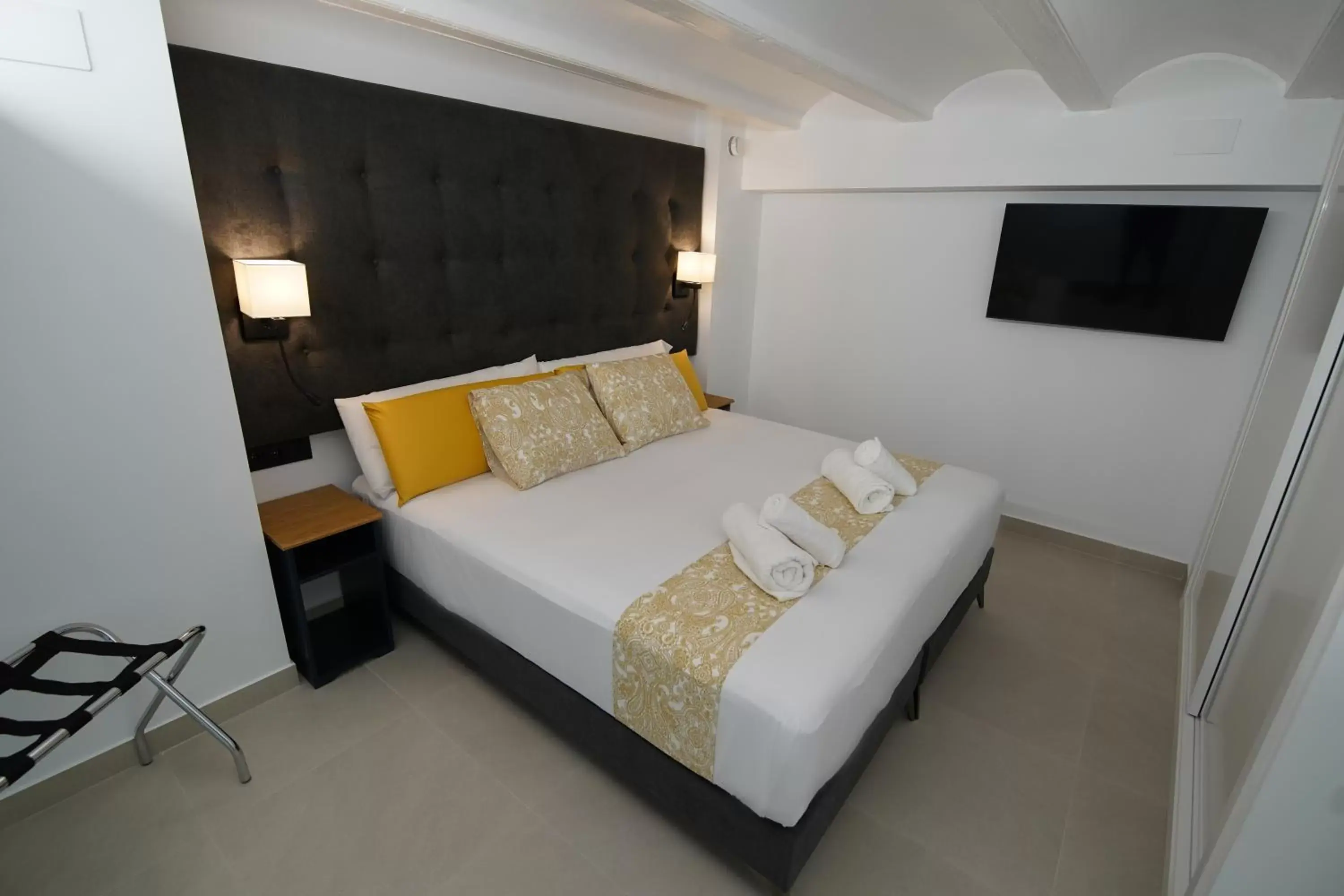 Bed in Suites Puerto Valencia