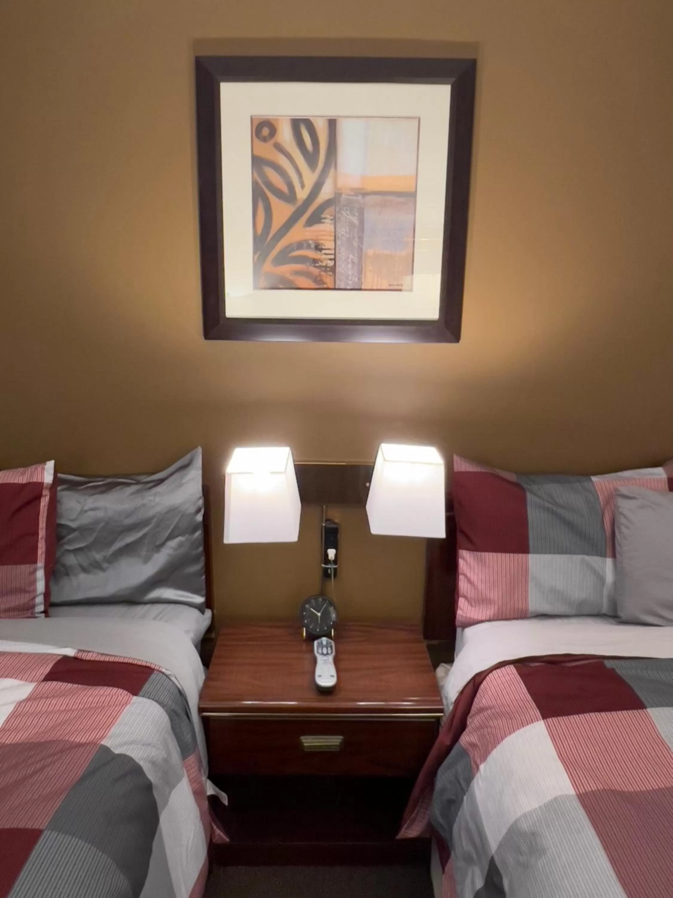 Bed in Monashee Motel