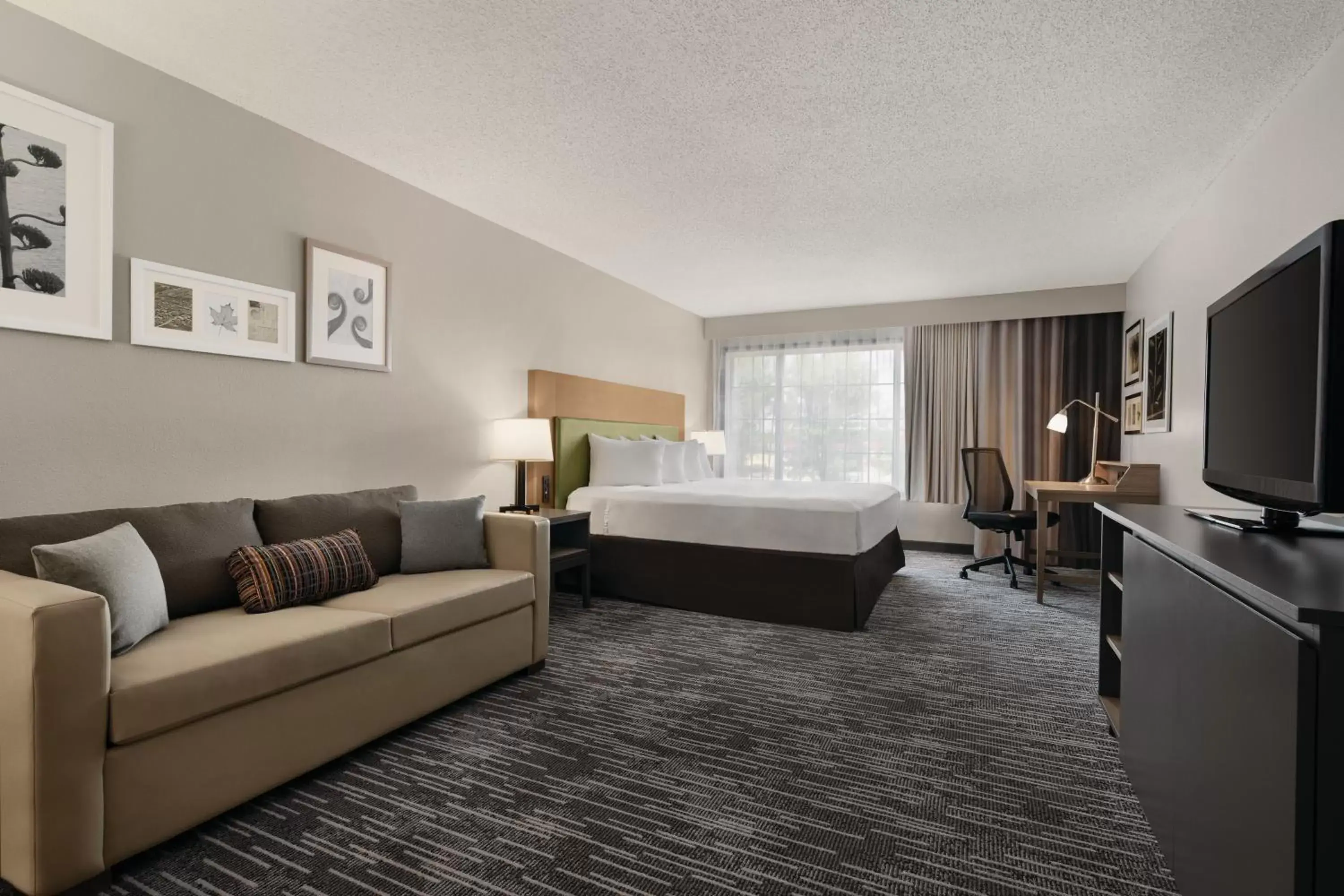 Living room, Seating Area in Country Inn & Suites by Radisson, Detroit Lakes, MN