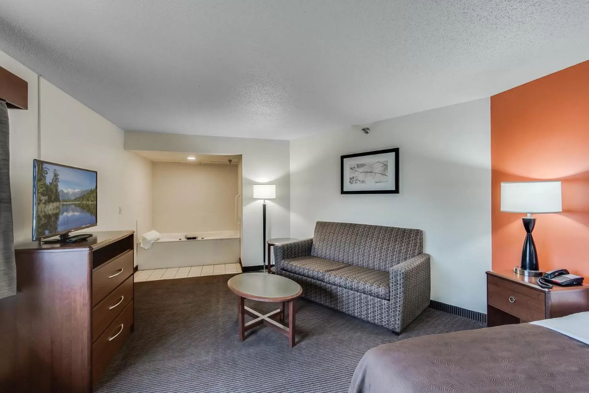 Seating Area in AmericInn by Wyndham Coon Rapids