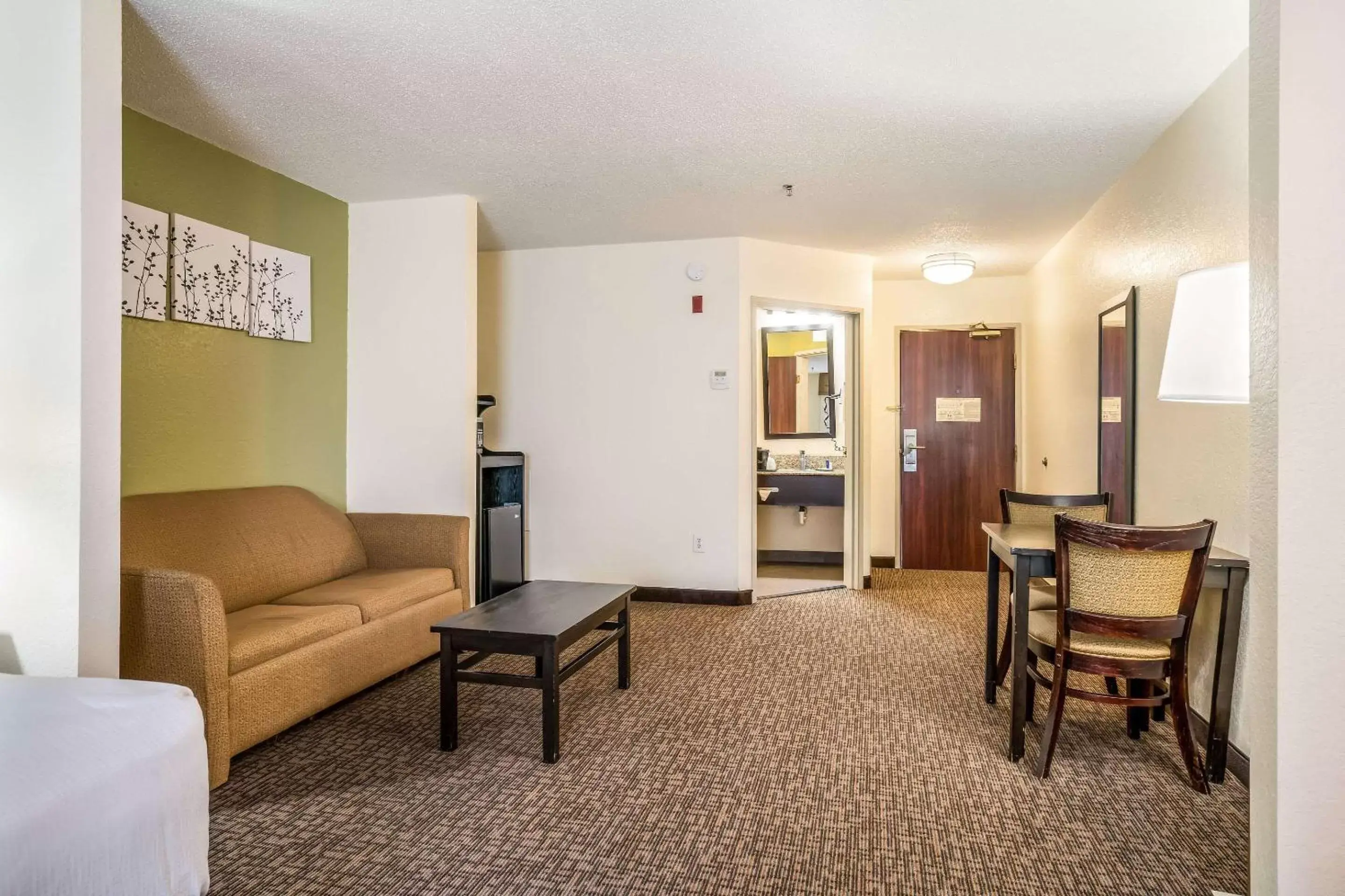Photo of the whole room, Seating Area in Sleep Inn & Suites Jacksonville near Camp Lejeune