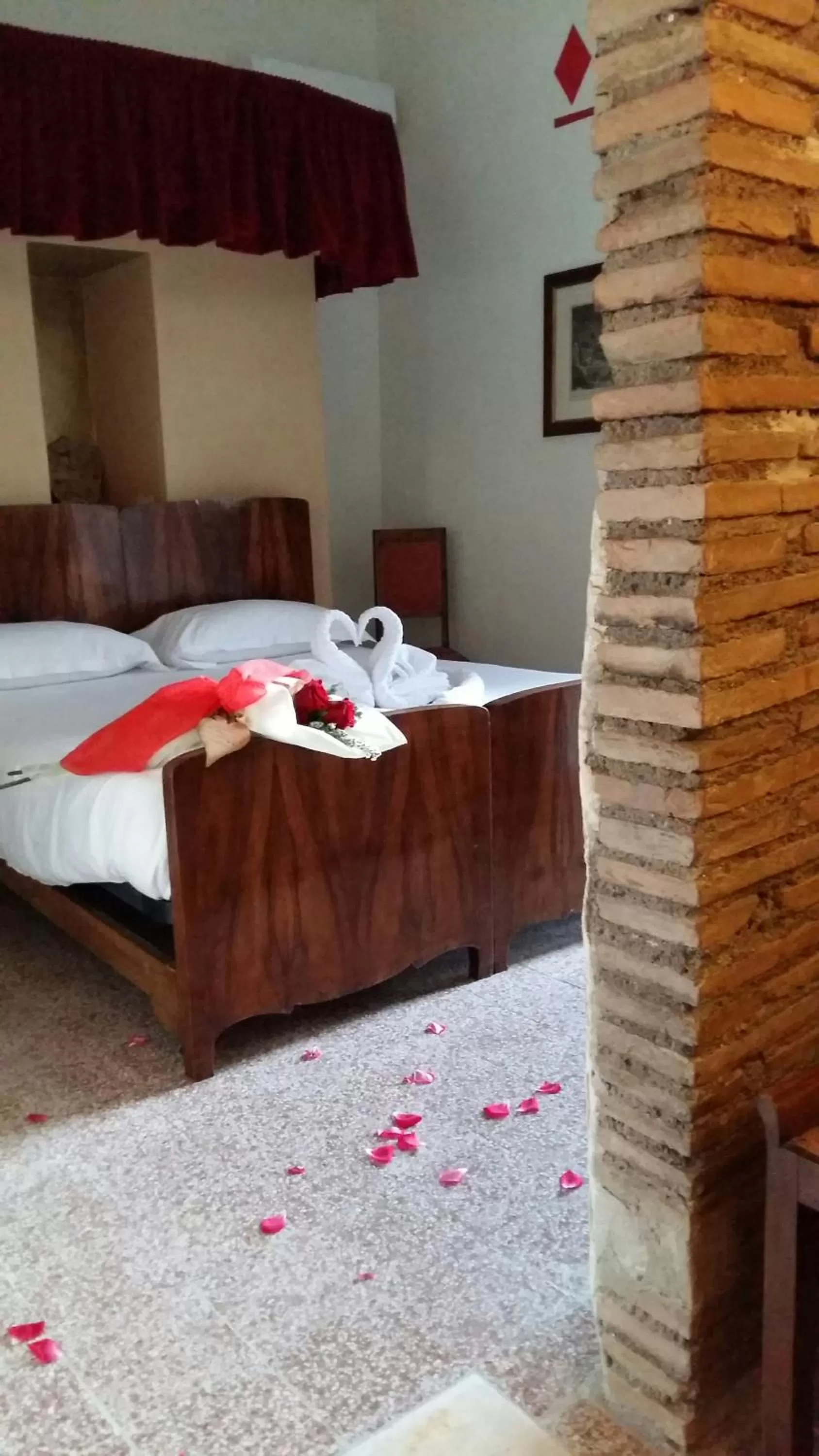 Bed in Antica Corte del Castello