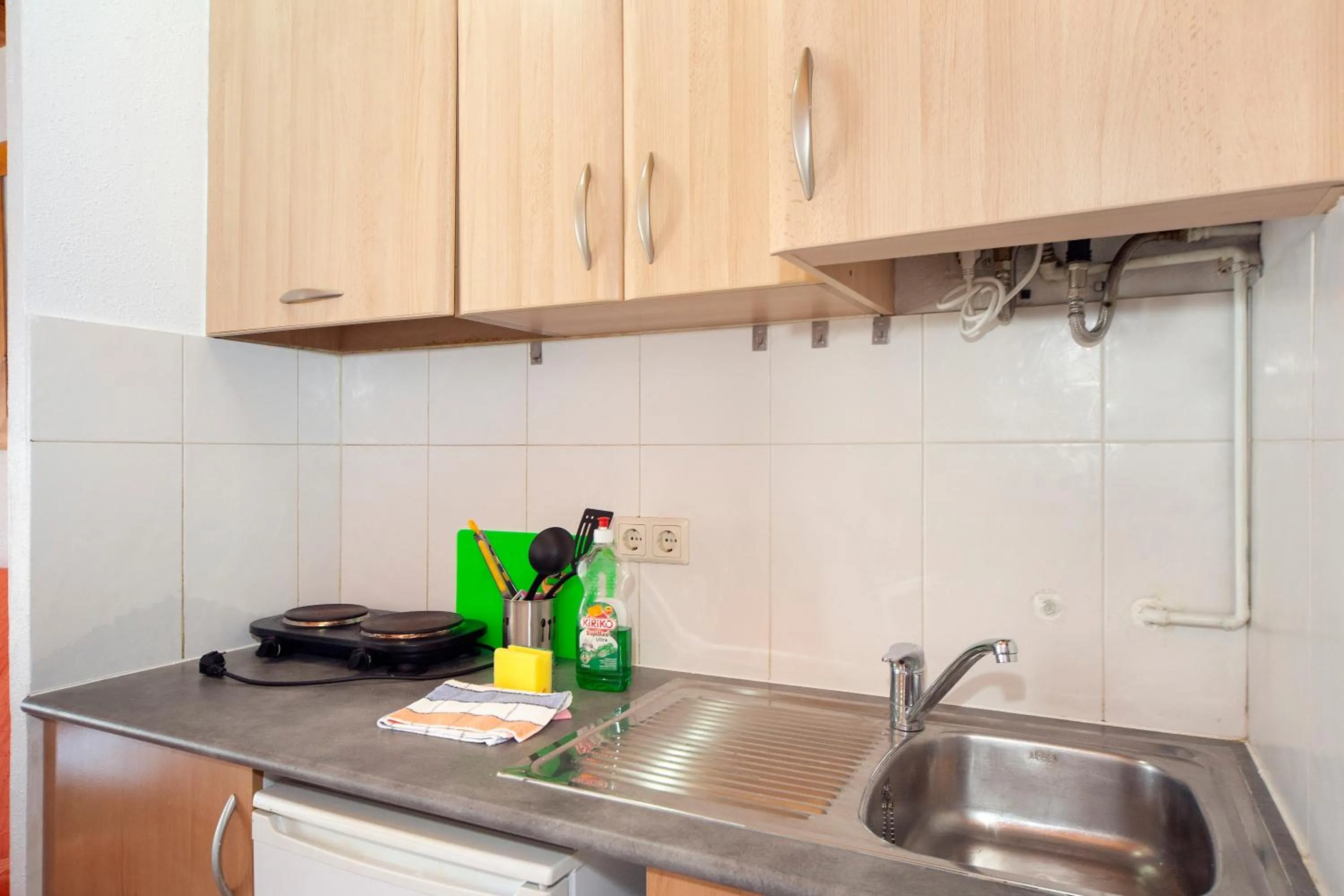 Kitchen or kitchenette in Aparthotel Carrio Sol - Monty´s