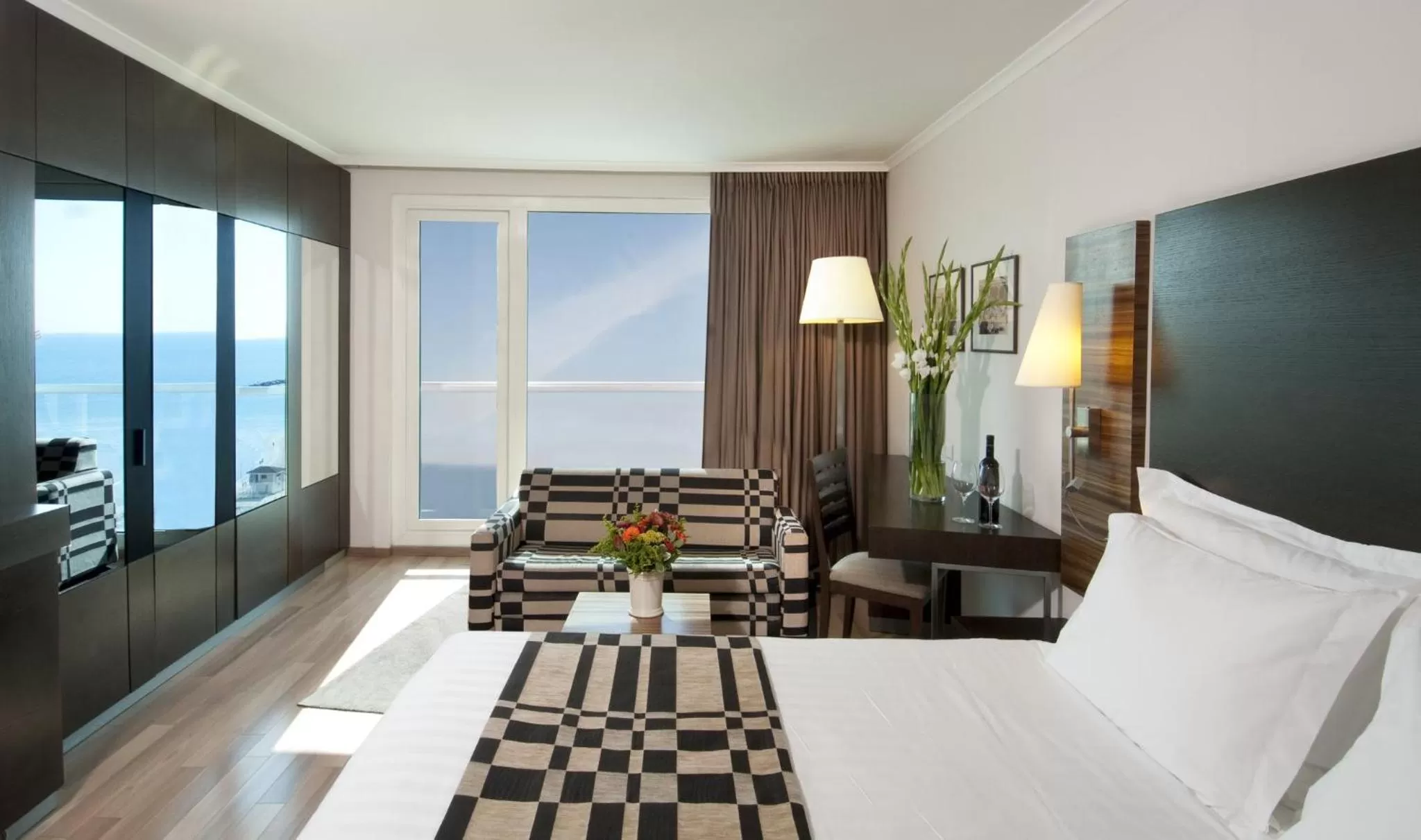 Photo of the whole room, Bed in Crowne Plaza Tel Aviv Beach by IHG