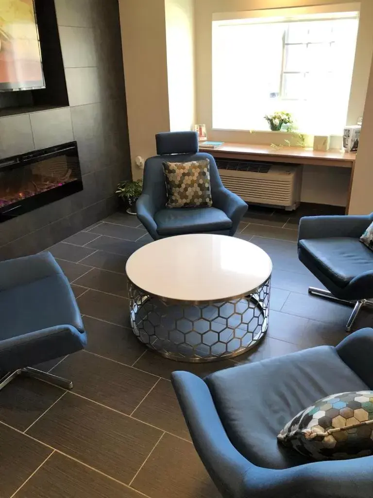 Communal lounge/ TV room, Seating Area in Microtel Inn & Suites by Wyndham Carlisle