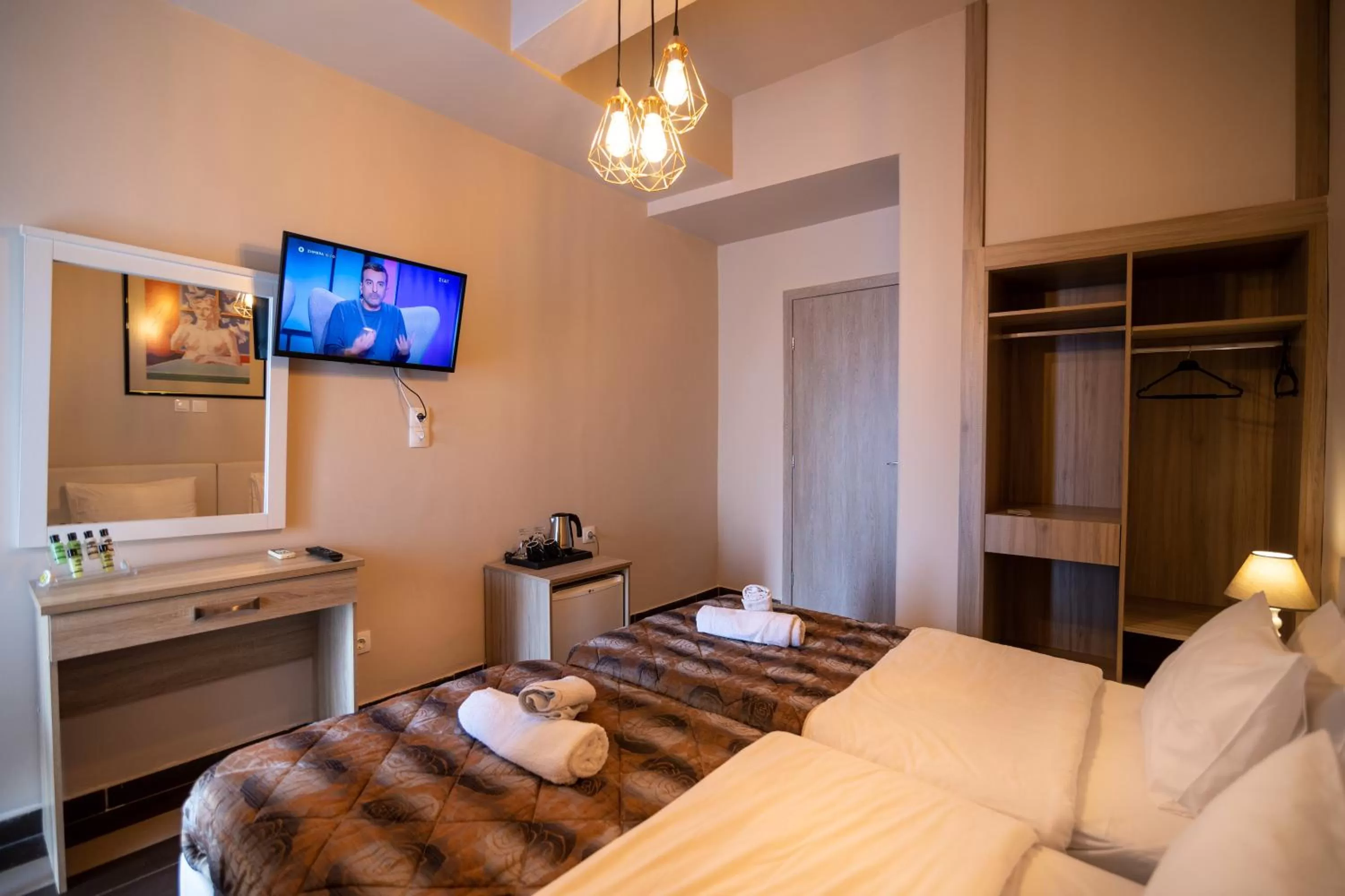 Bed in Votsalakia Hotel & Luxury Apartments