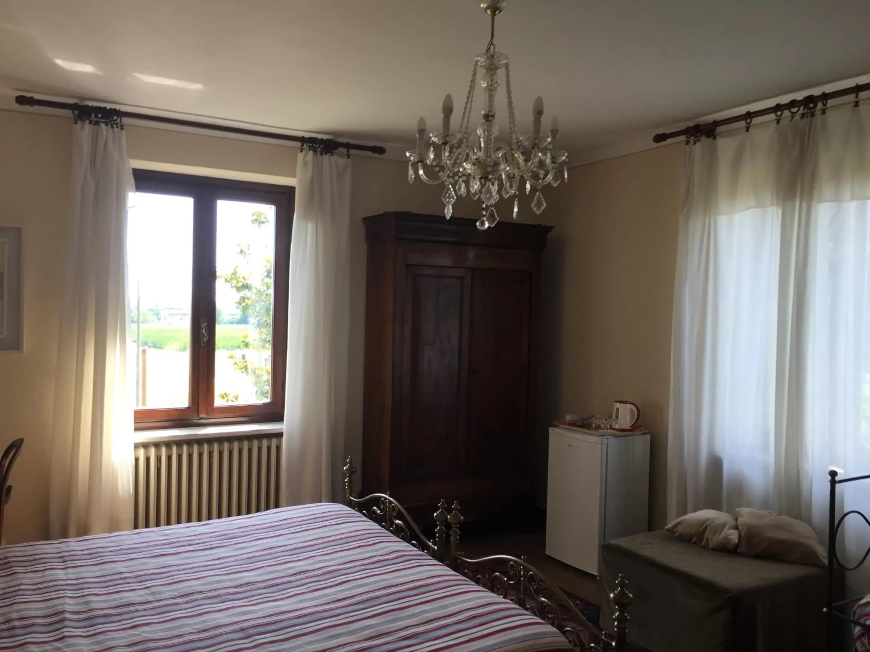 Bed in VILLA LE ROSE