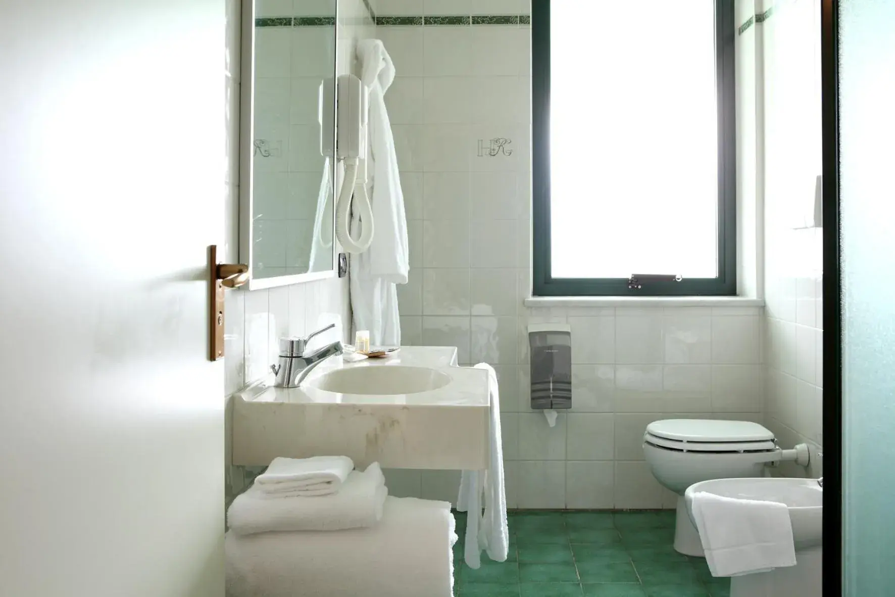 Bathroom in Hotel Romanisio