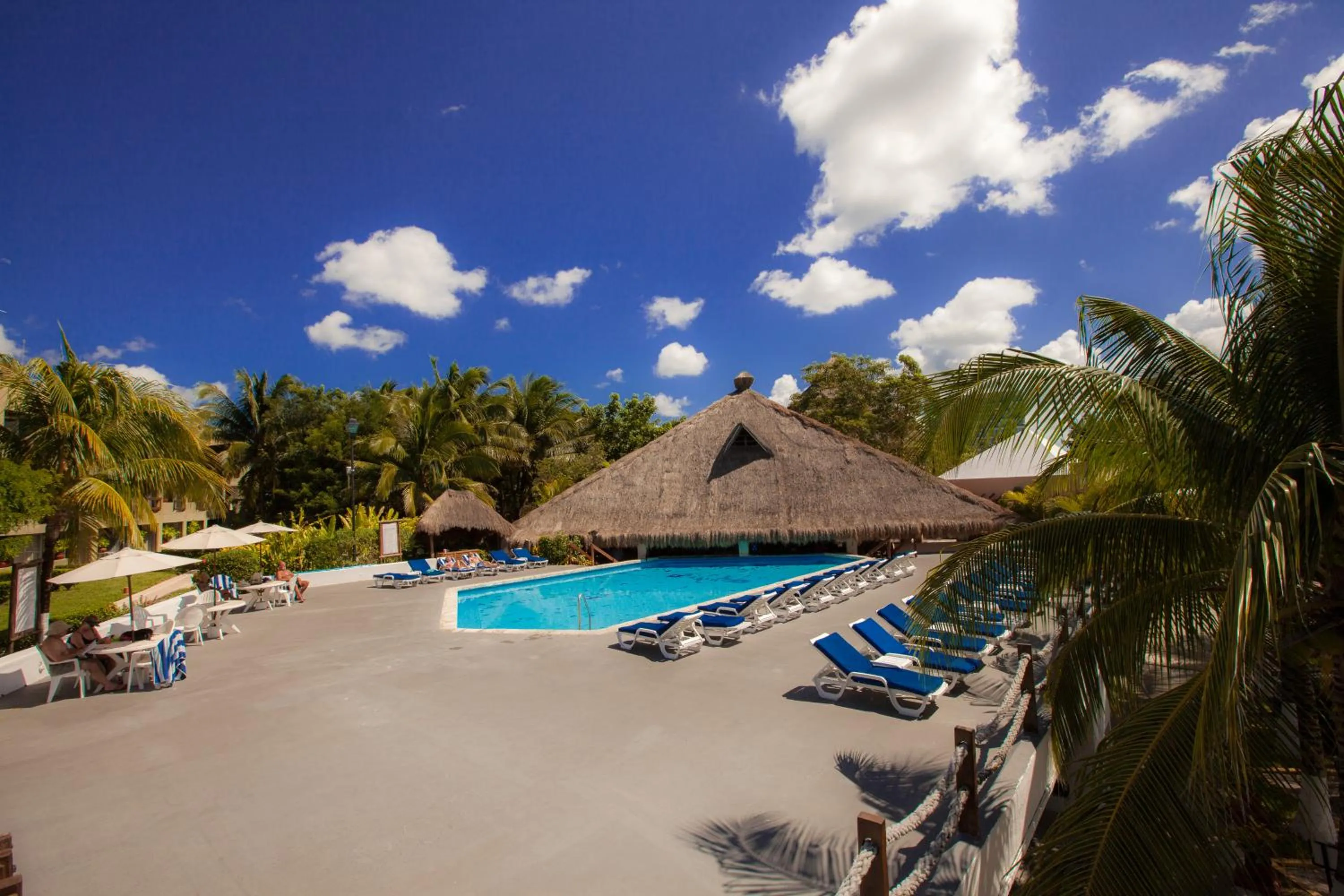Swimming pool in Casa del Mar Cozumel Hotel & Dive Resort with free access to an exclusive beach club