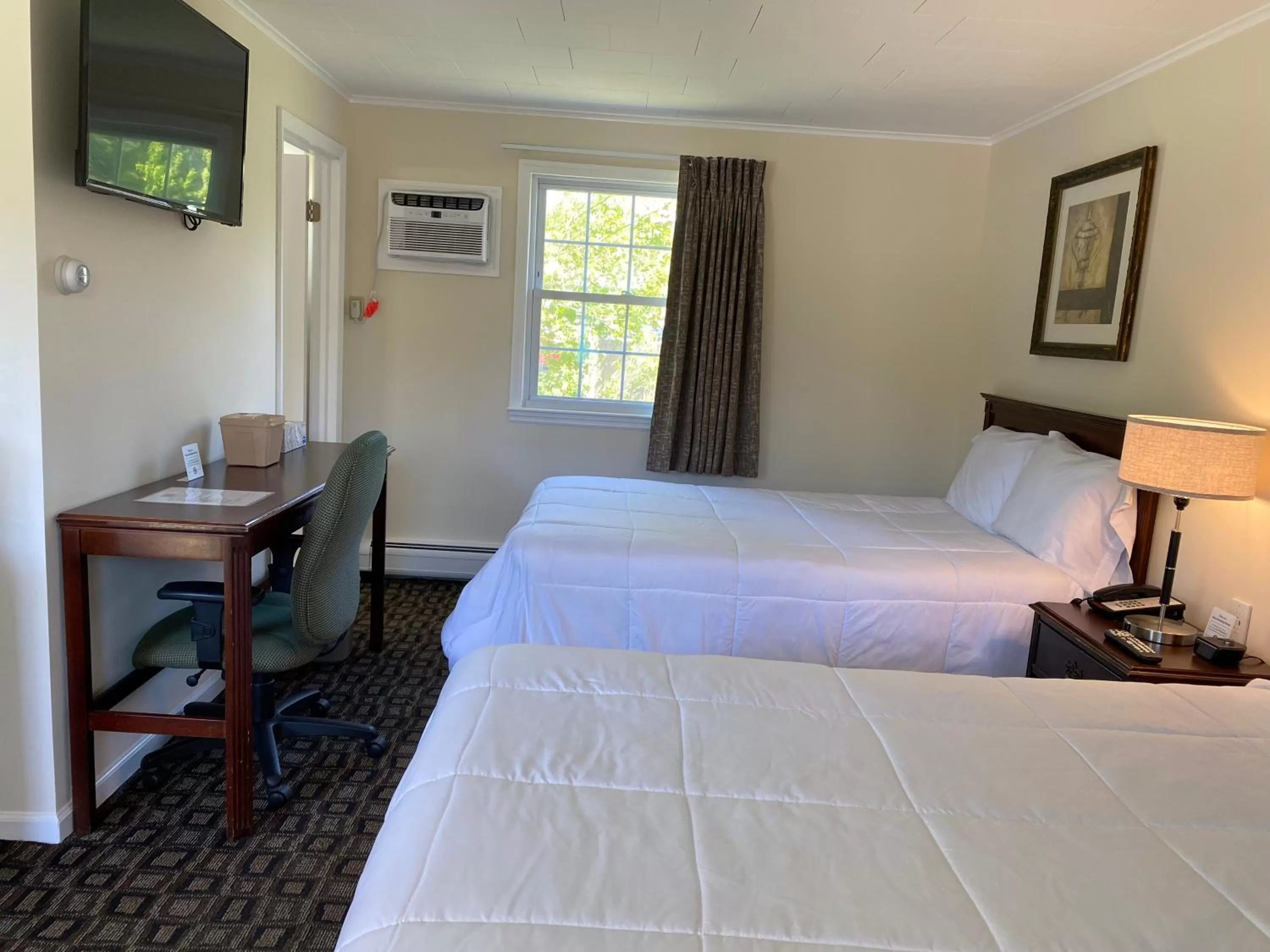 Bed in Villager Motel