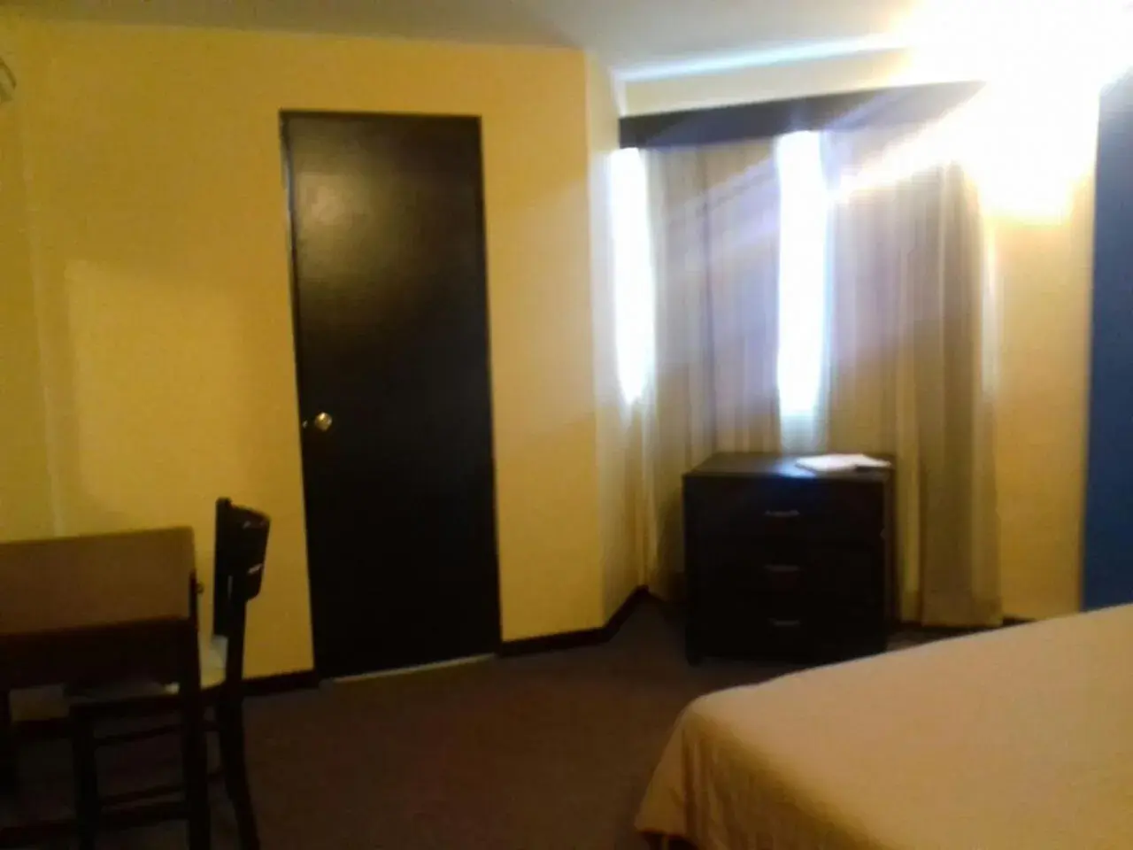 Seating area, Bed in CHN Hotel Monterrey Santa Fe Seating area, Bed in CHN Hotel Monterrey Santa Fe