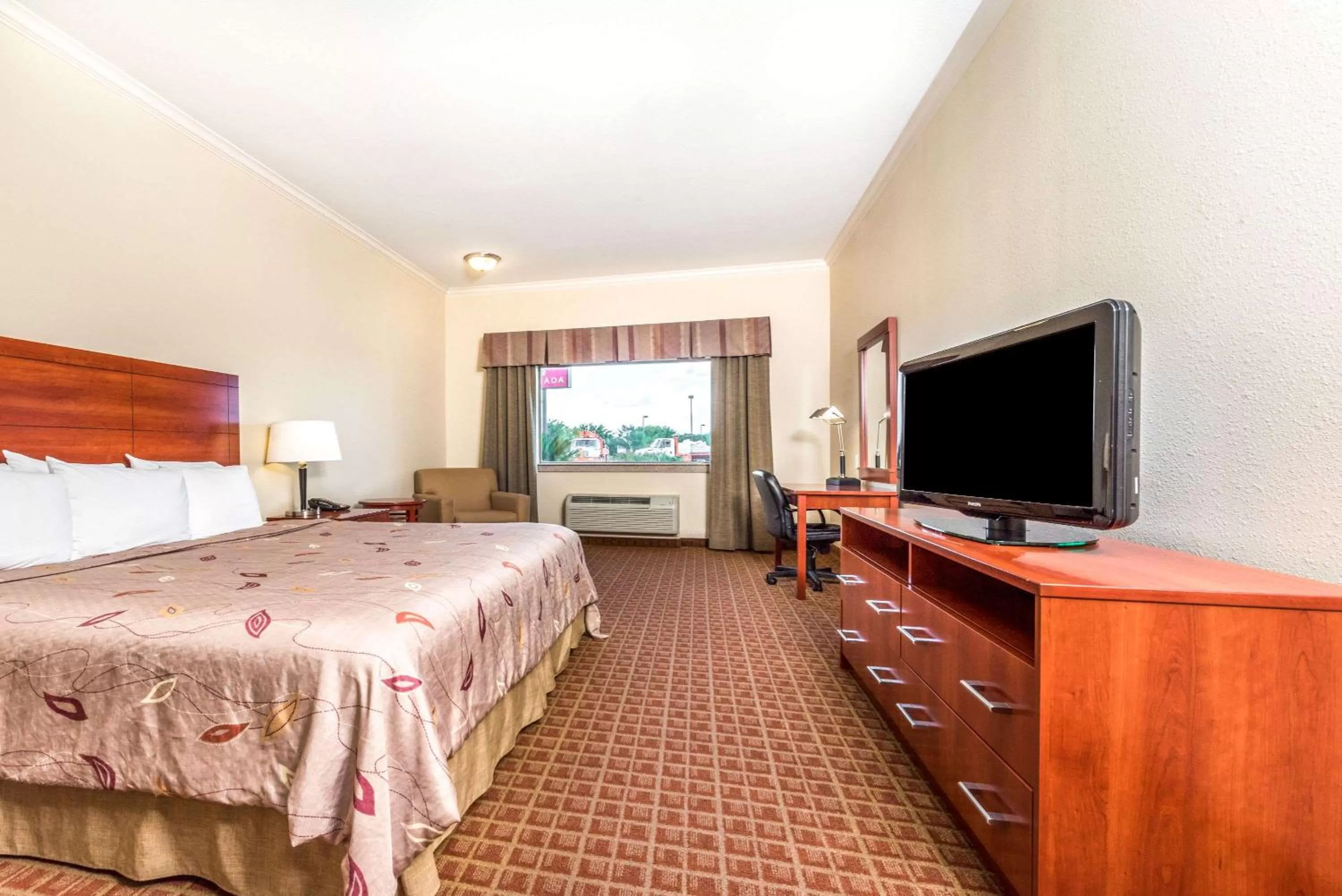 Photo of the whole room, Bed in Ramada by Wyndham College Station