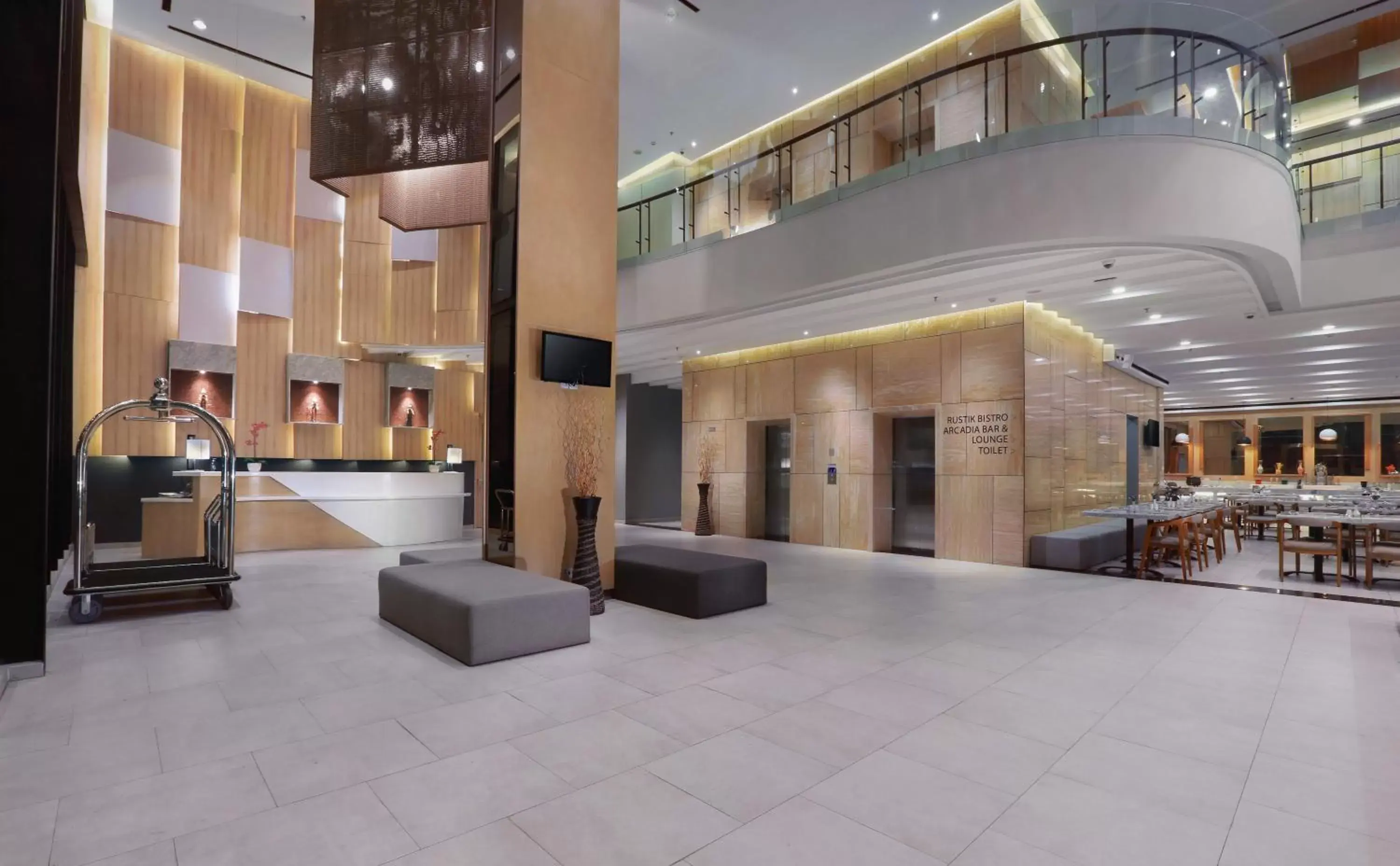 Lobby or reception in Harper Cikarang by ASTON