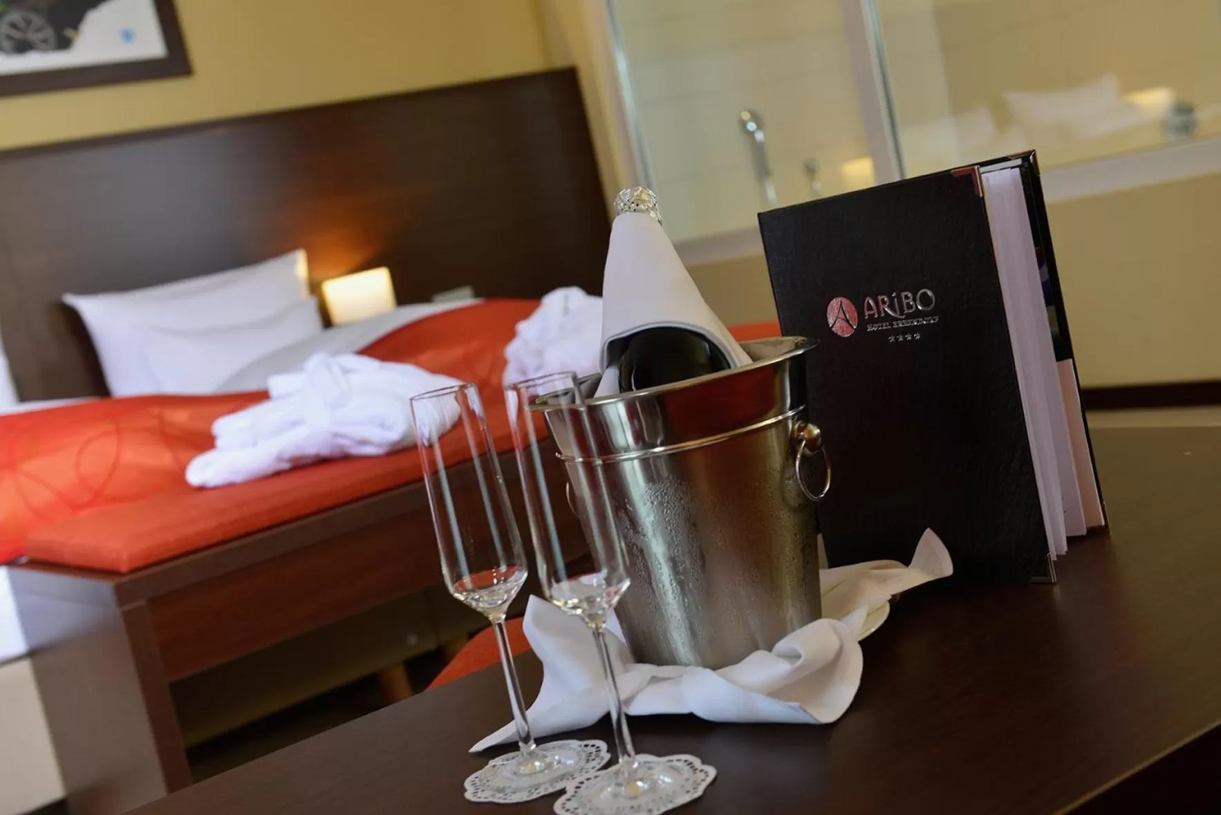 Photo of the whole room, Bed in Aribo Hotel