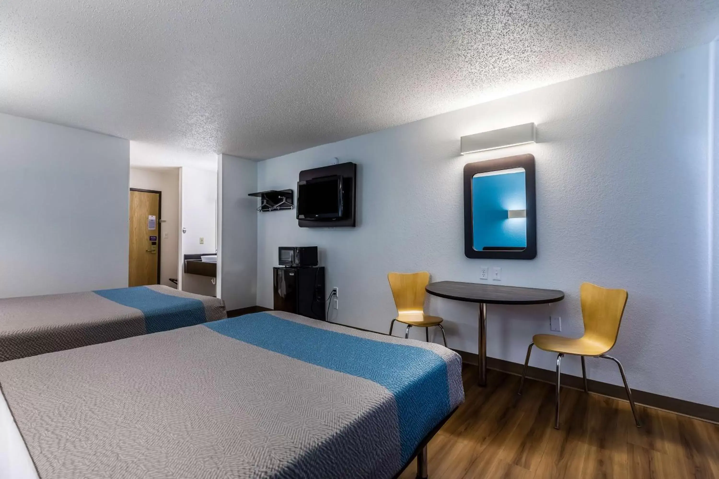 Bedroom, TV/Entertainment Center in Motel 6-Indianapolis, IN - Southport