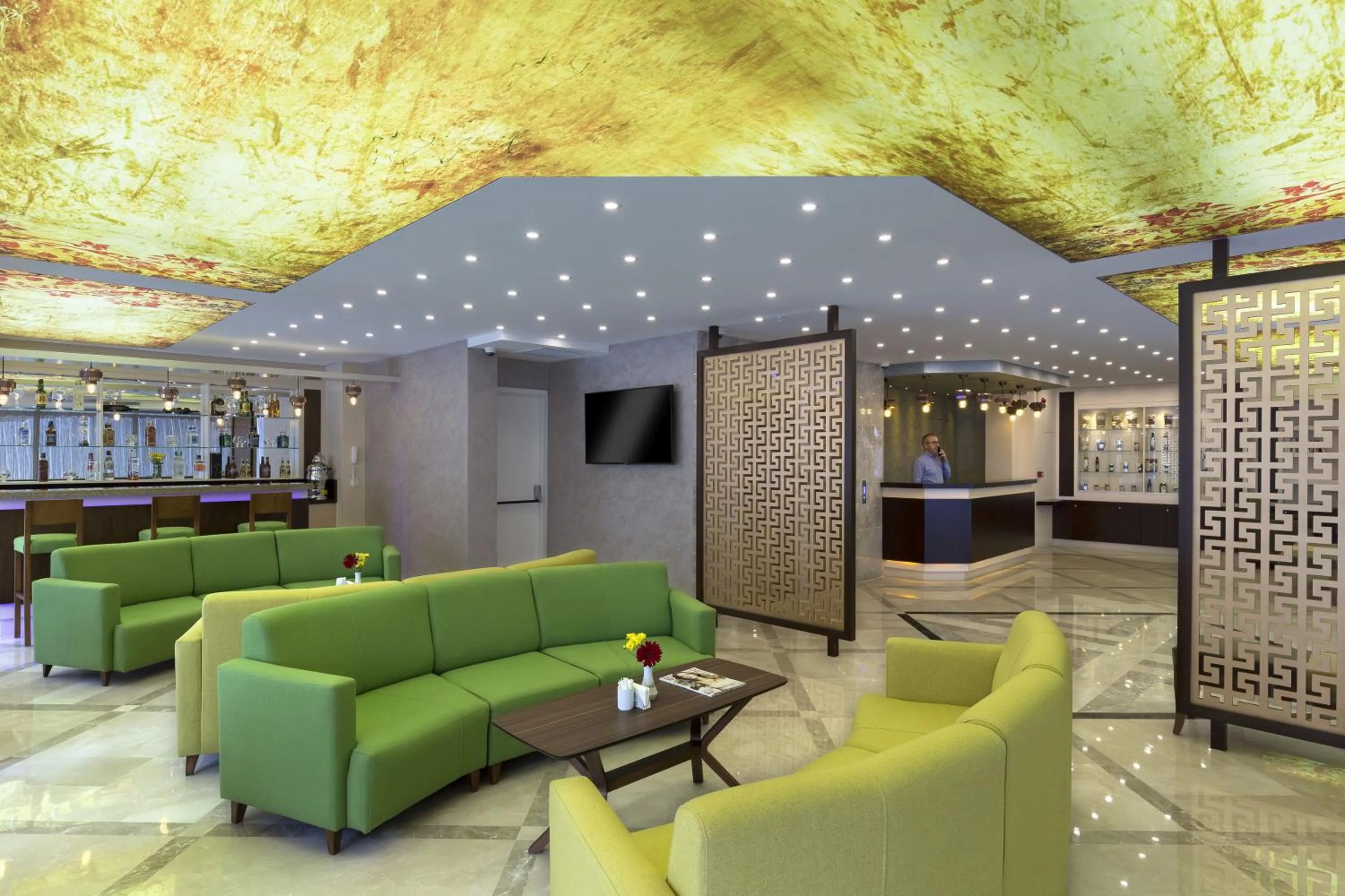 Communal lounge/ TV room in Regard Hotel