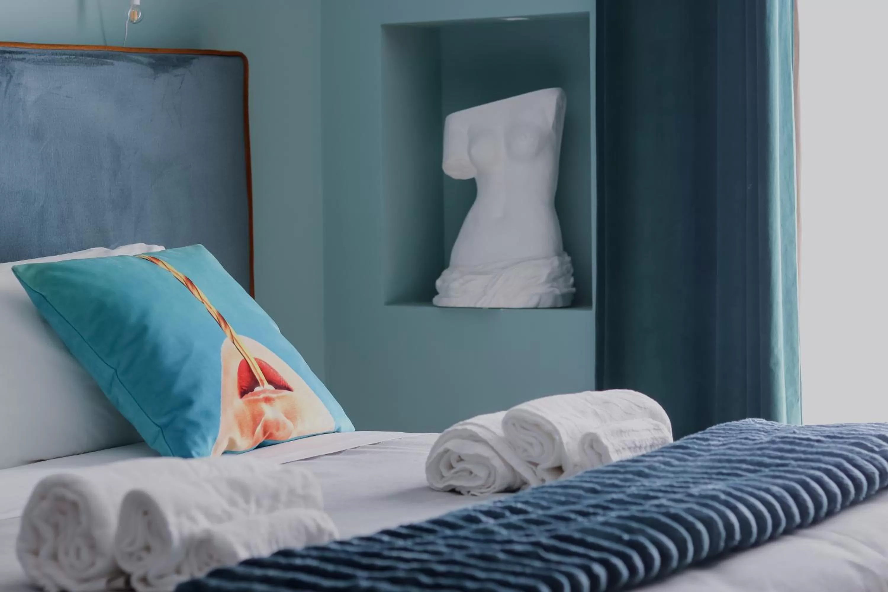 Bed in Aron Only Suites Bed and Breakfast