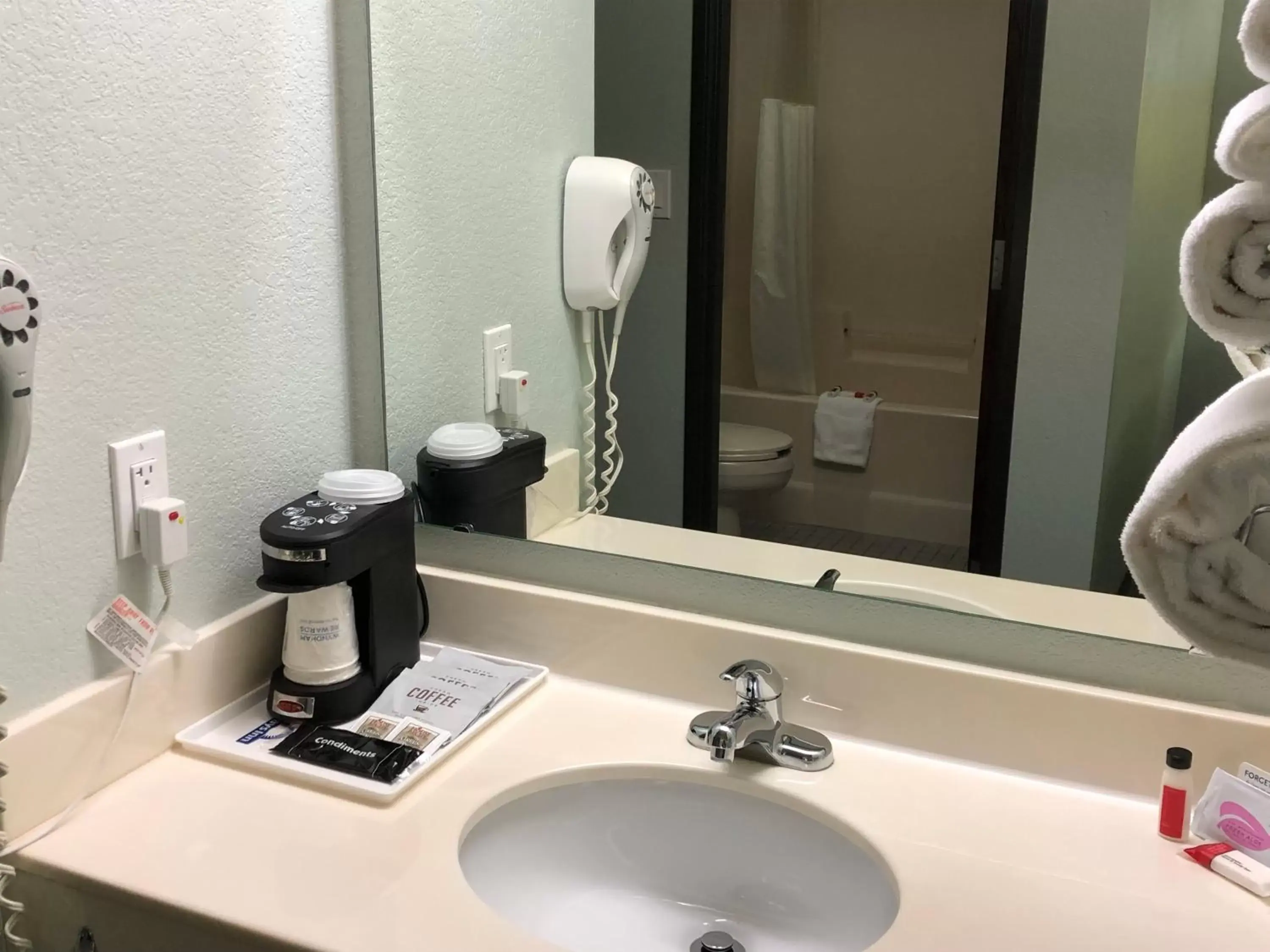 Bathroom in Days Inn by Wyndham Iron Mountain