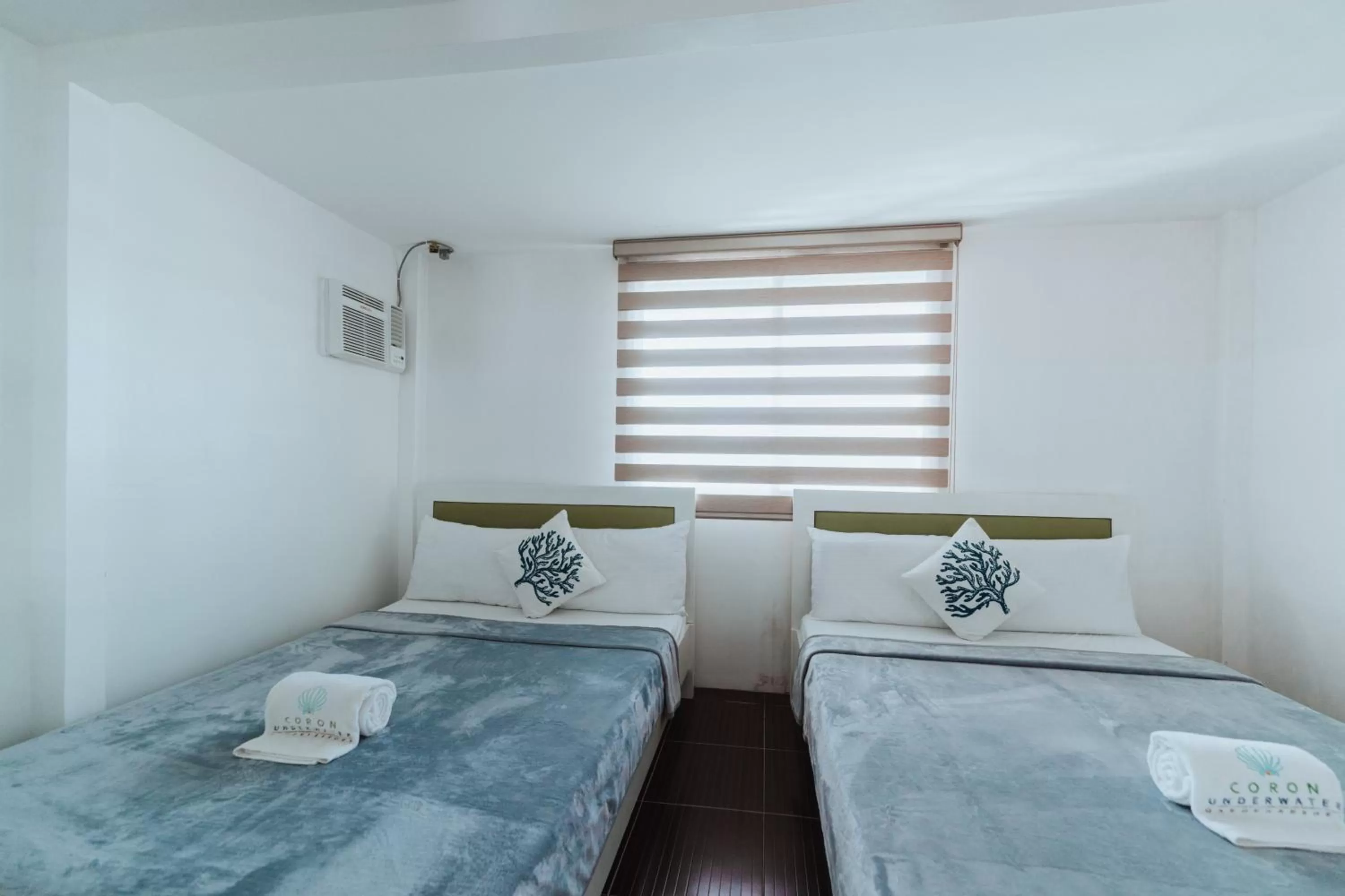 Bed in Coron Underwater Garden Resort