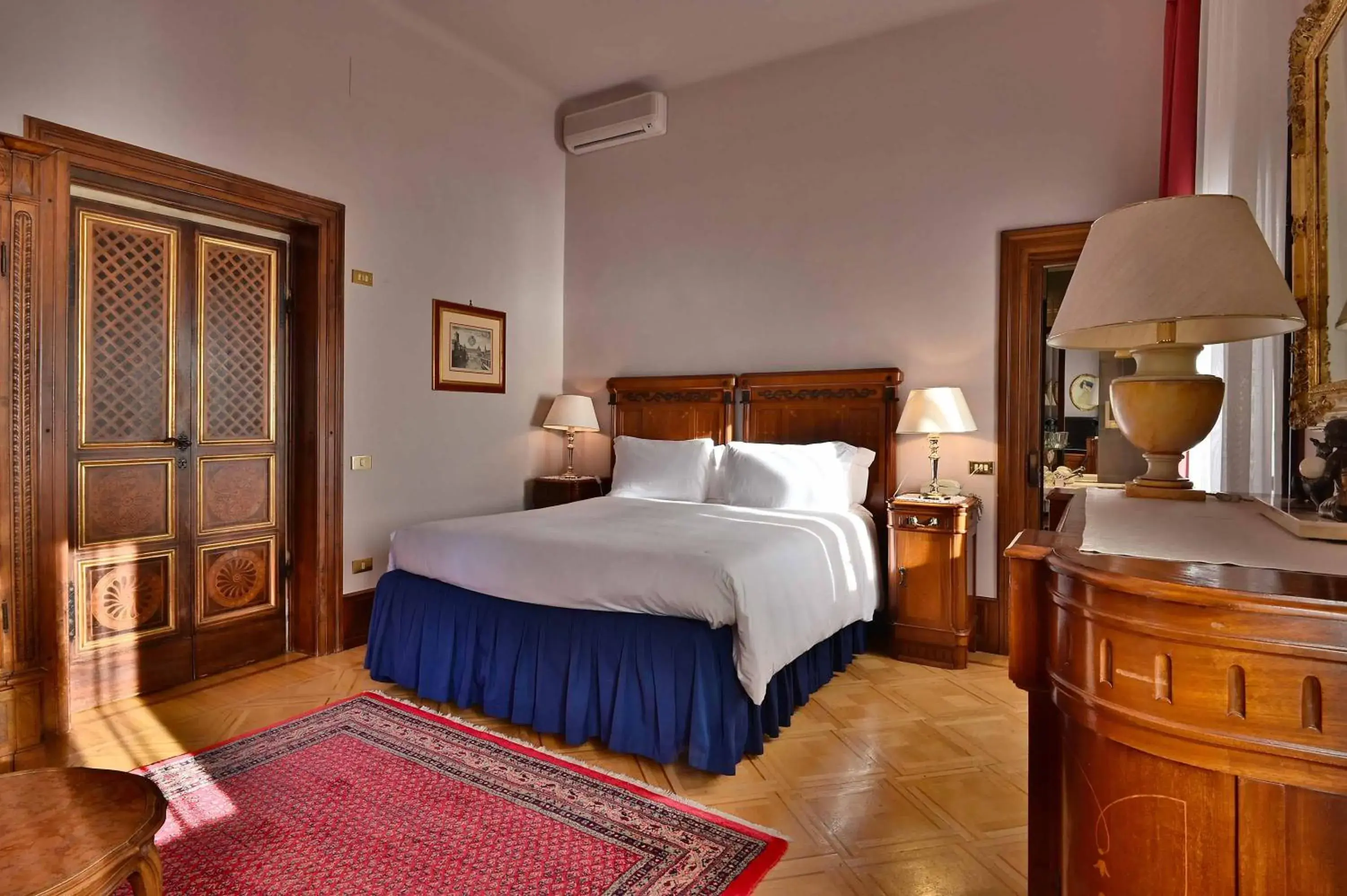 Bed in Hotel Villa Fiordaliso