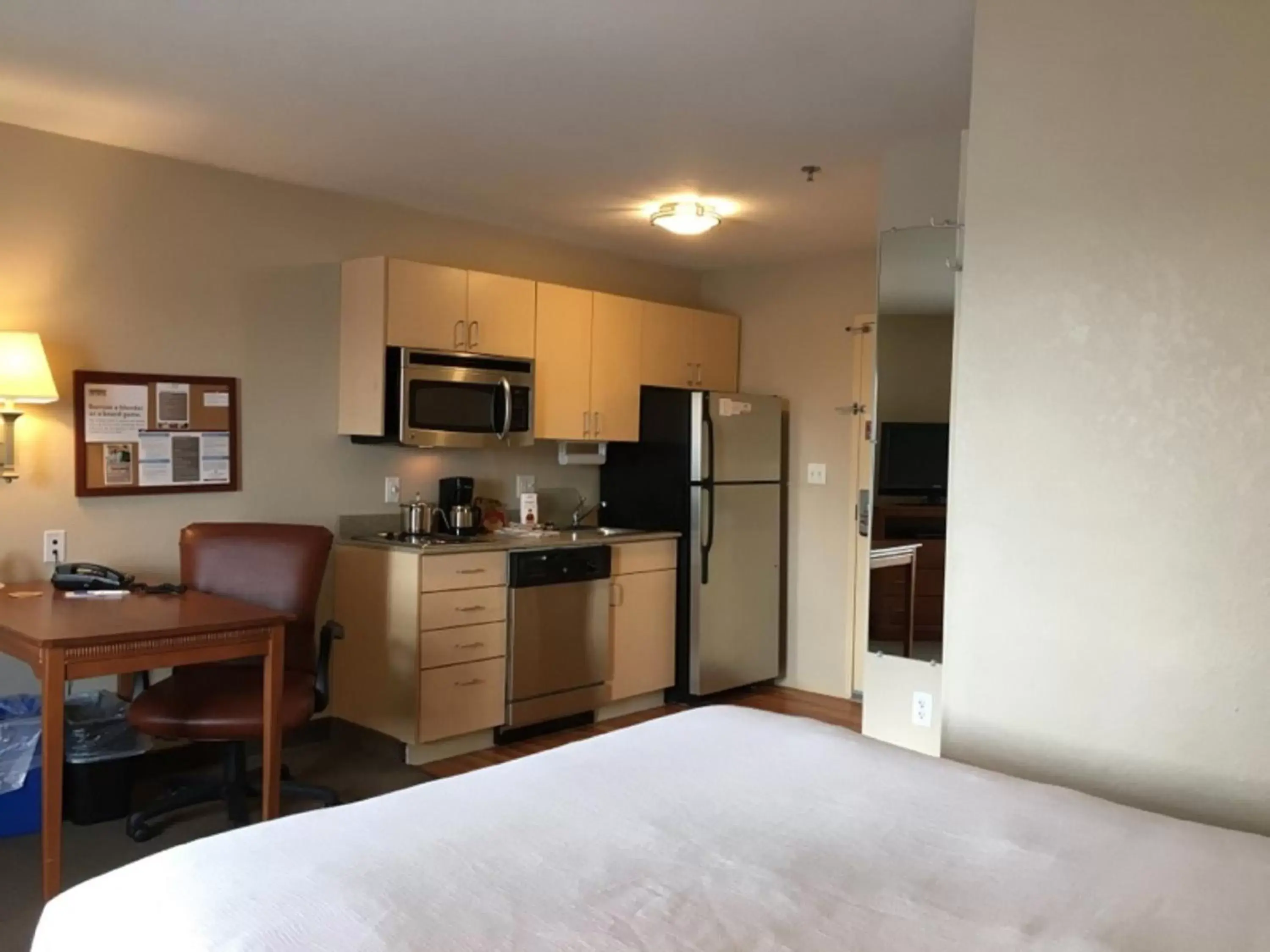 Photo of the whole room, Kitchen/Kitchenette in Candlewood Suites Watertown Fort Drum, an IHG Hotel