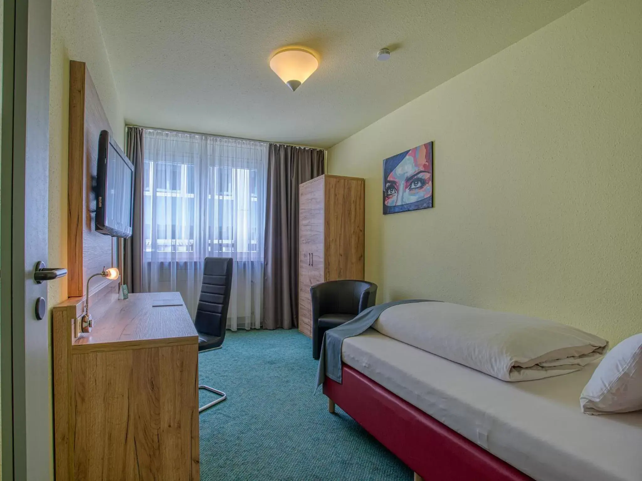 Photo of the whole room, Bed in Centro Hotel Böblingen