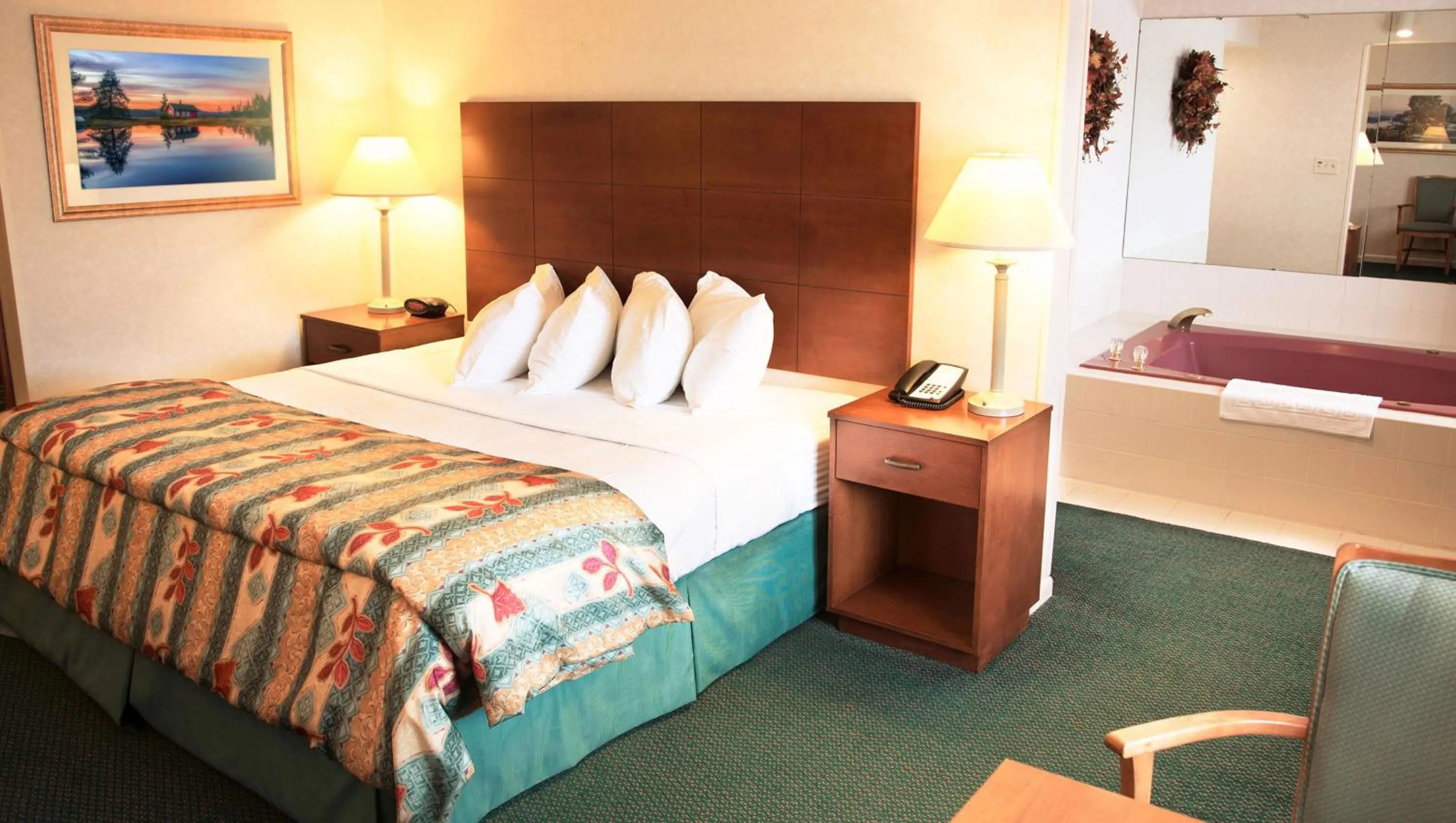 Bedroom, Bed in Magnuson Grand Pioneer Inn and Suites