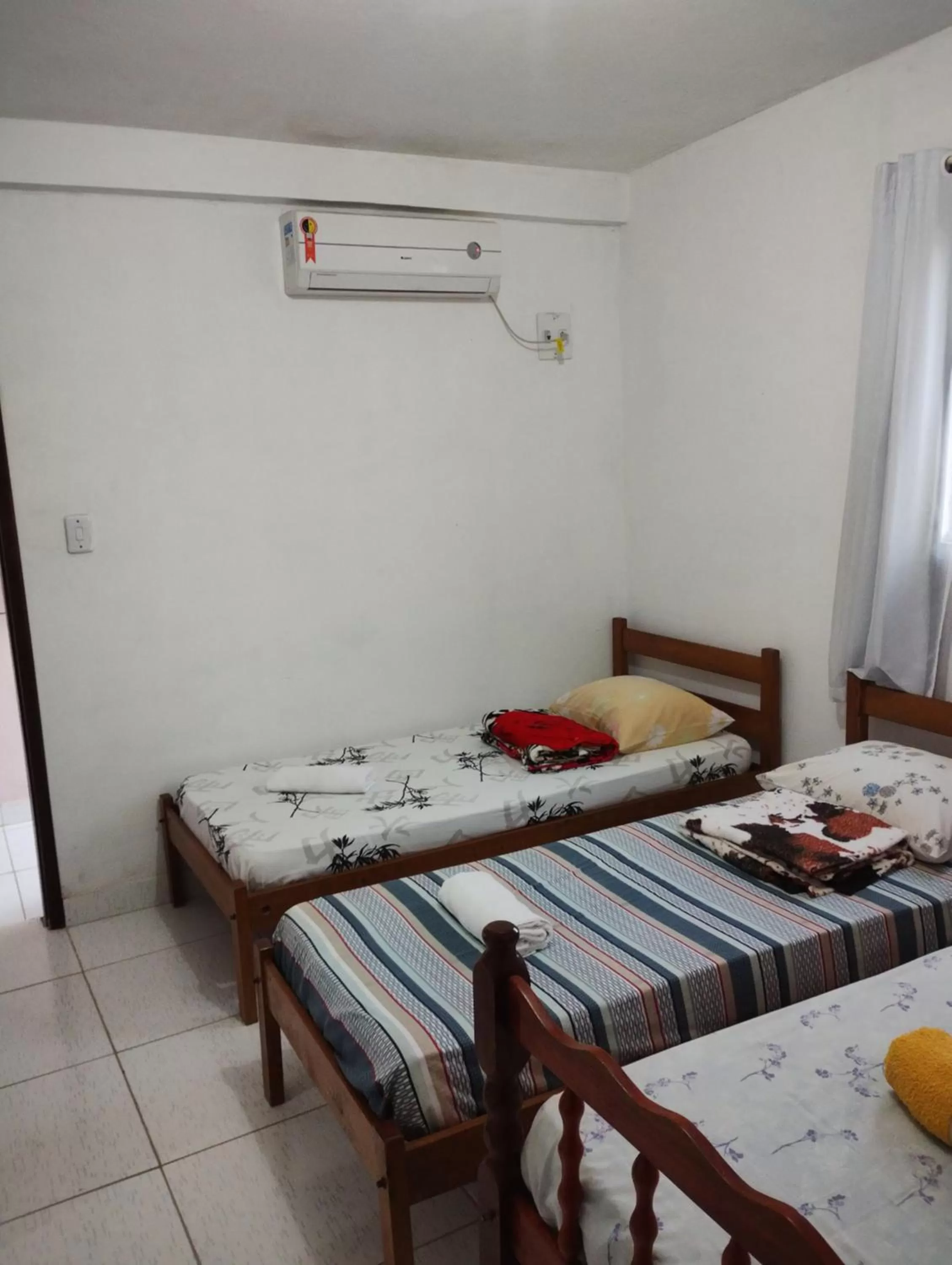 Bed in Pousada dos Ventos