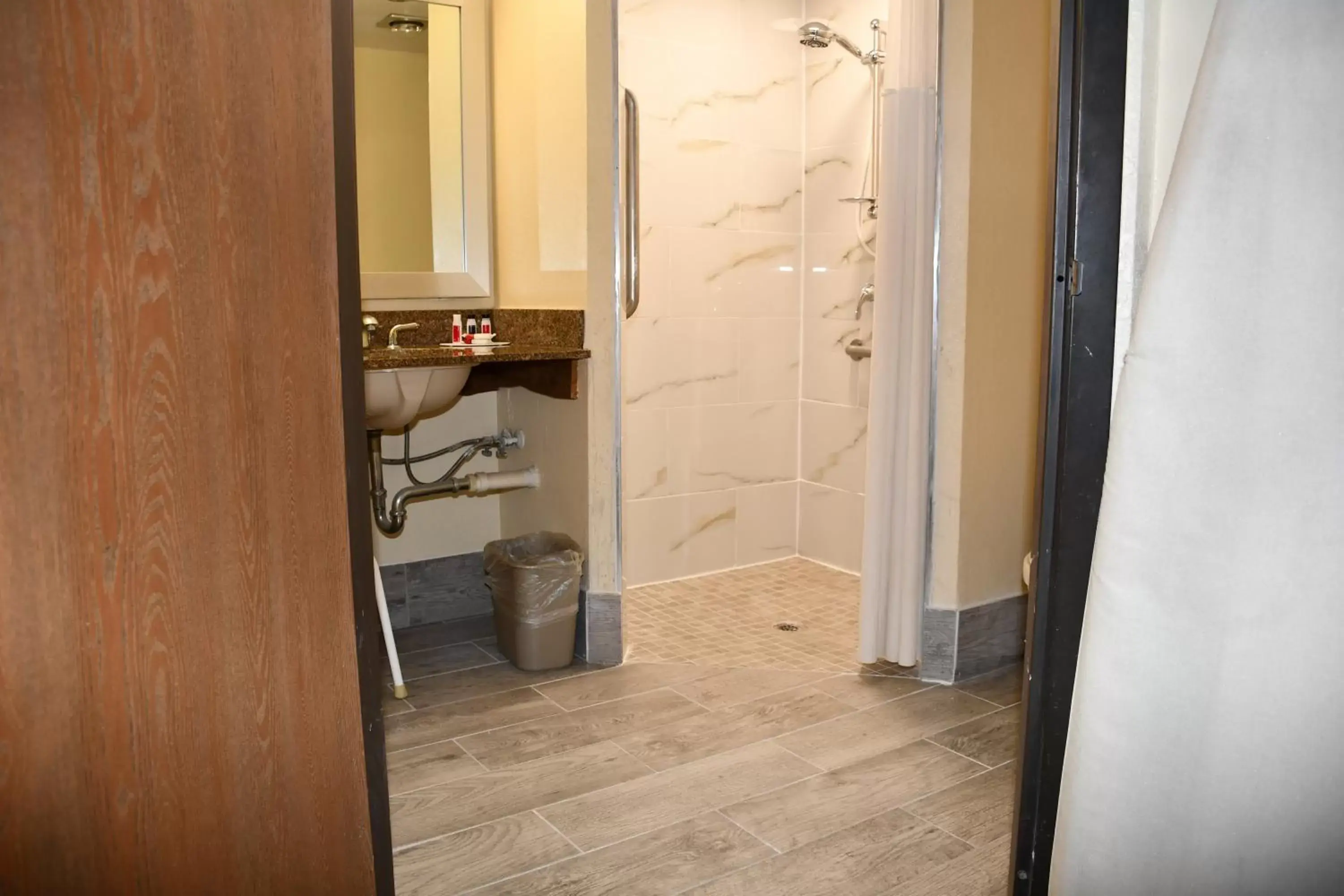 Bathroom in Days Inn by Wyndham Mounds View Twin Cities North