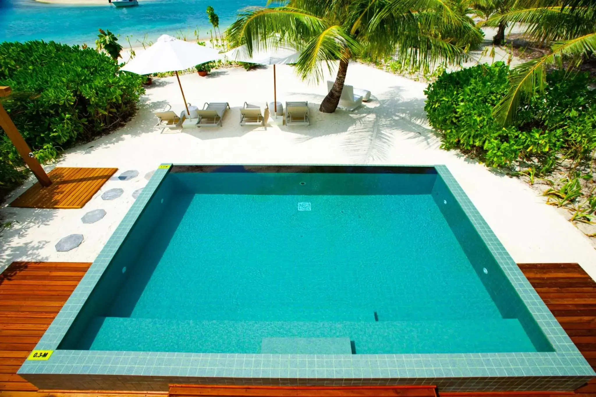 Bedroom, Swimming Pool in Holiday Inn Resort Kandooma Maldives - Kids Stay & Eat Free