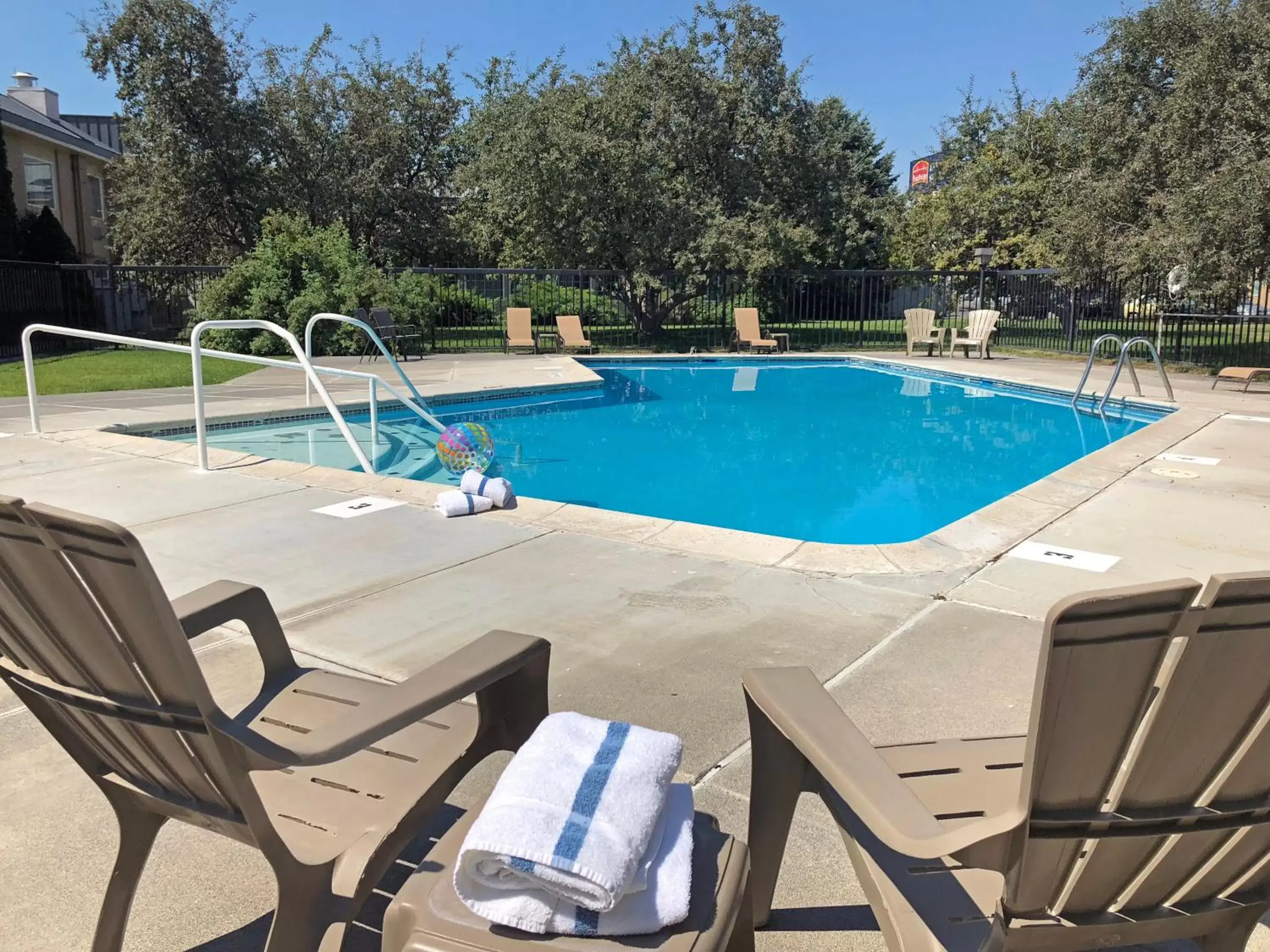 Swimming Pool in FairBridge Extended Stay, a Kitchenette Hotel
