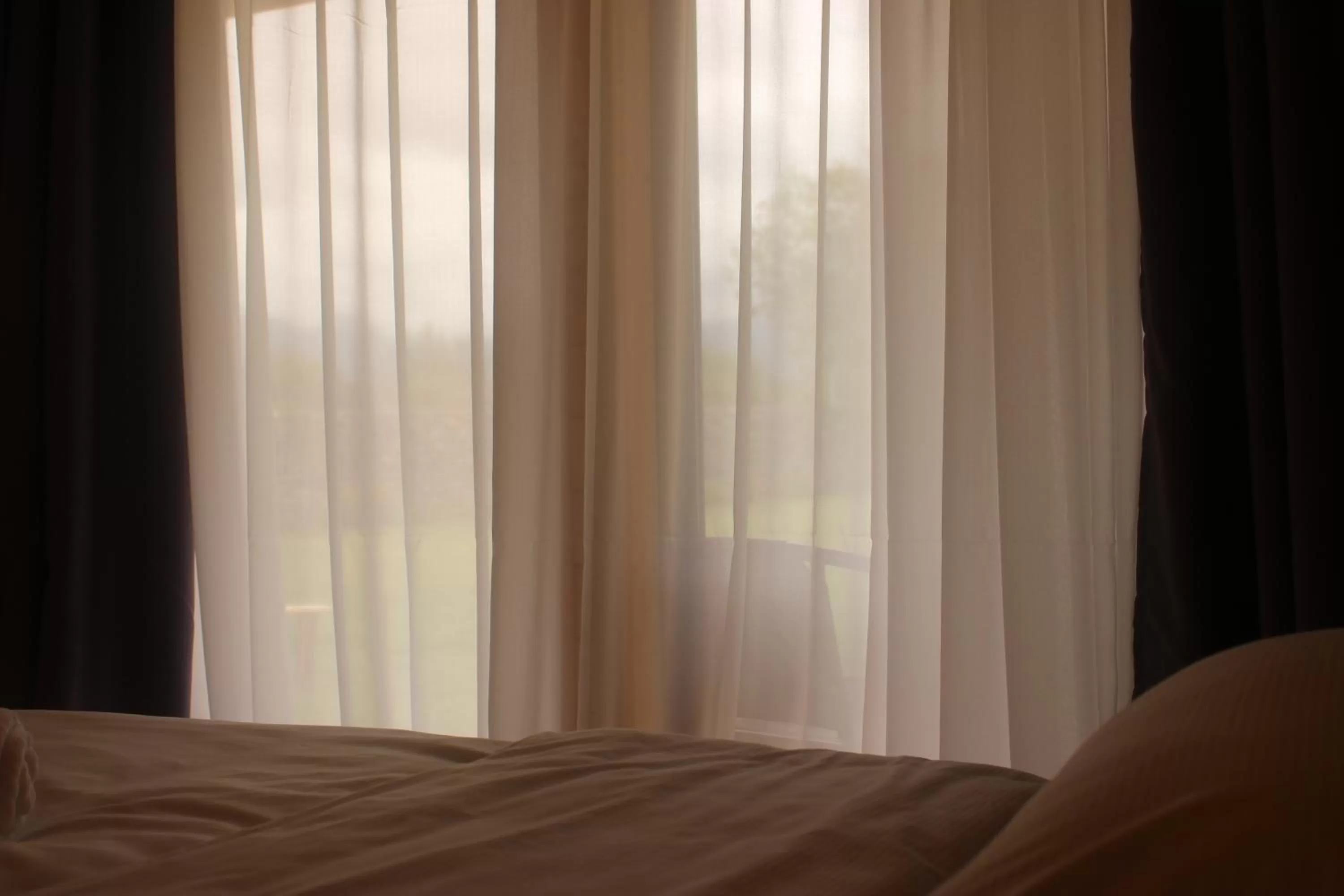 Bed in Chubini Winery & Cabins