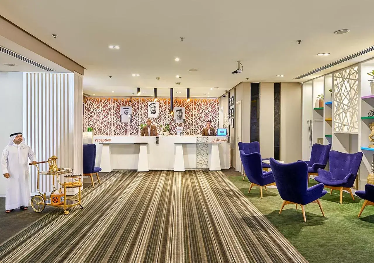 Lobby or reception in Ramada Hotel, Suites and Apartments by Wyndham Dubai JBR