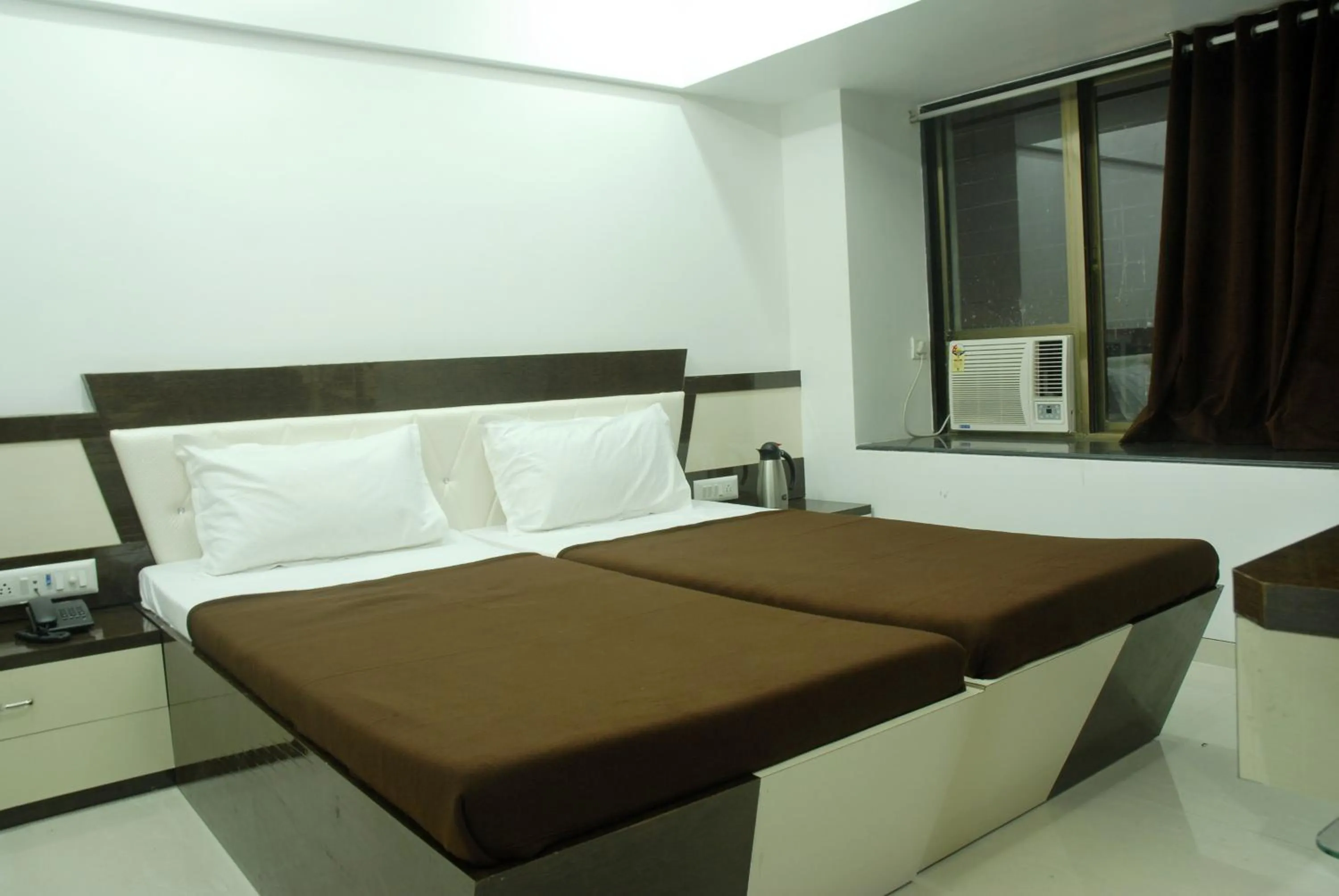 Bed in Hotel City View