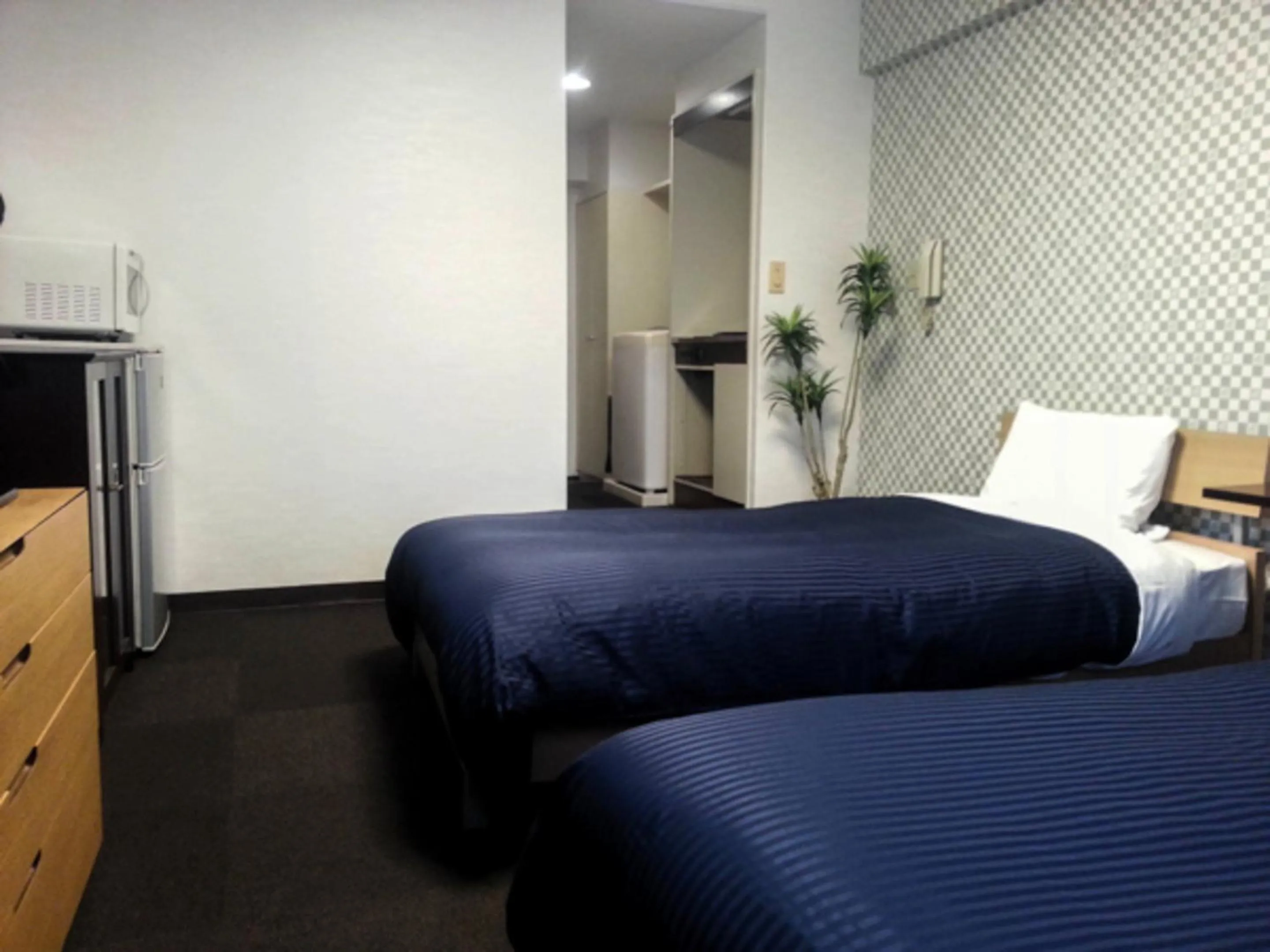 Bed in HOTEL LiVEMAX BUDGET Fuchu