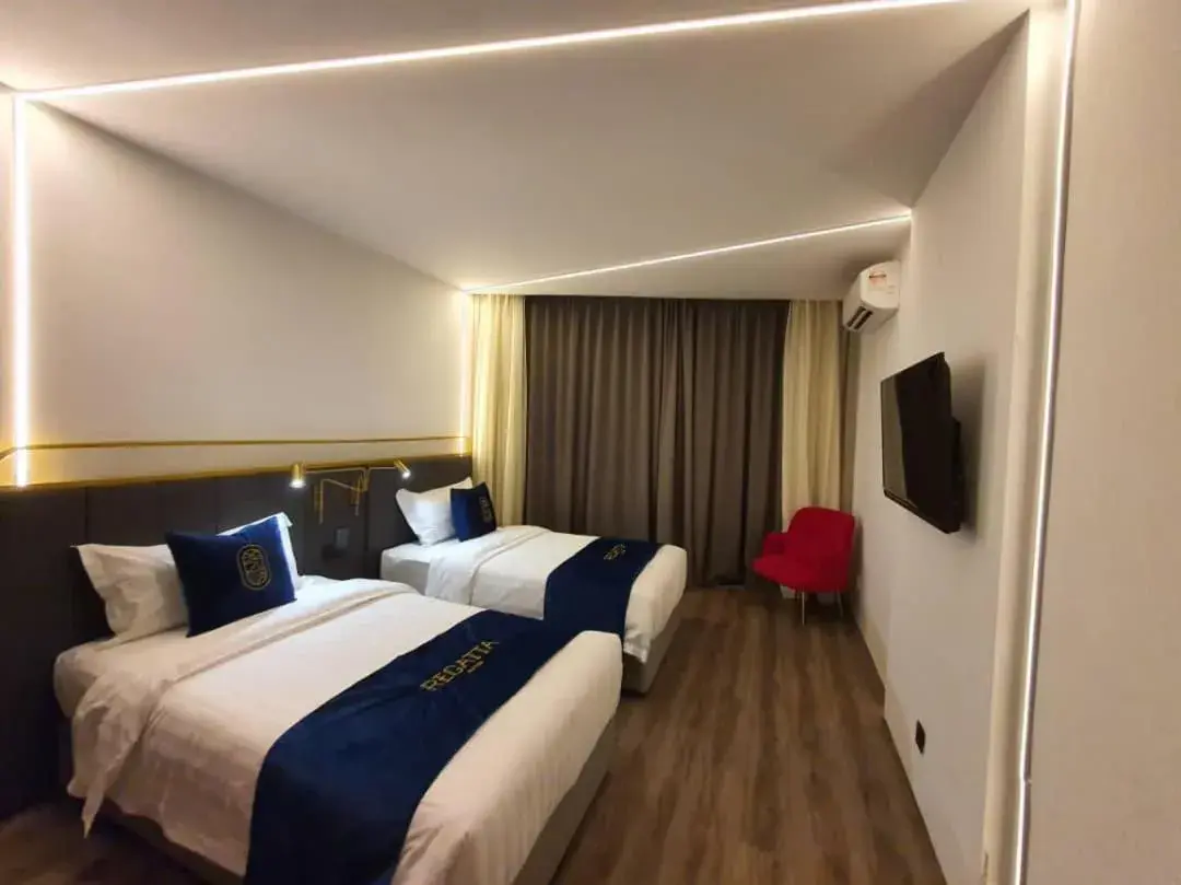 Bed in Regatta Suites Kozi Square Kuching