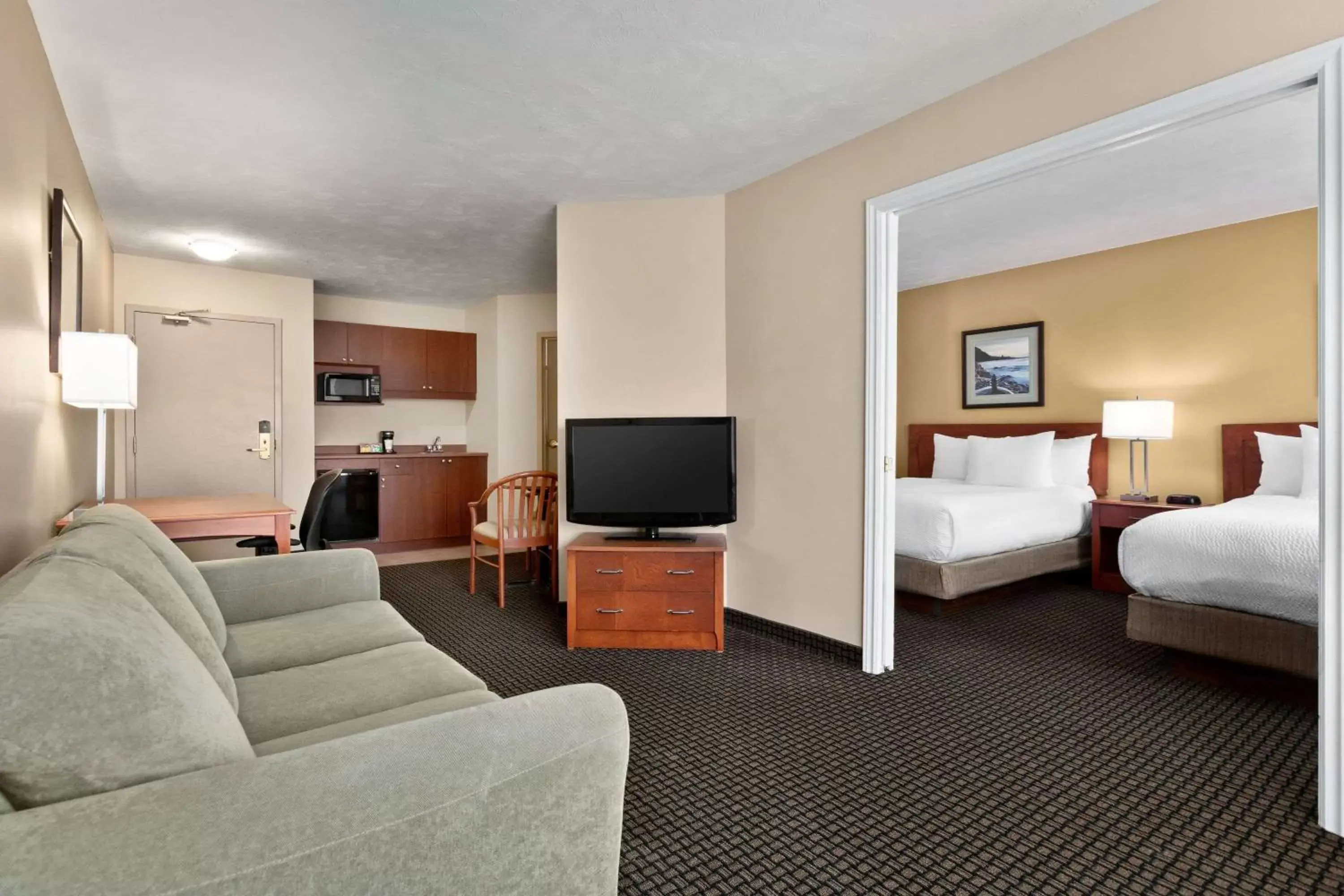 Photo of the whole room, Seating Area in Days Inn & Suites by Wyndham Moncton