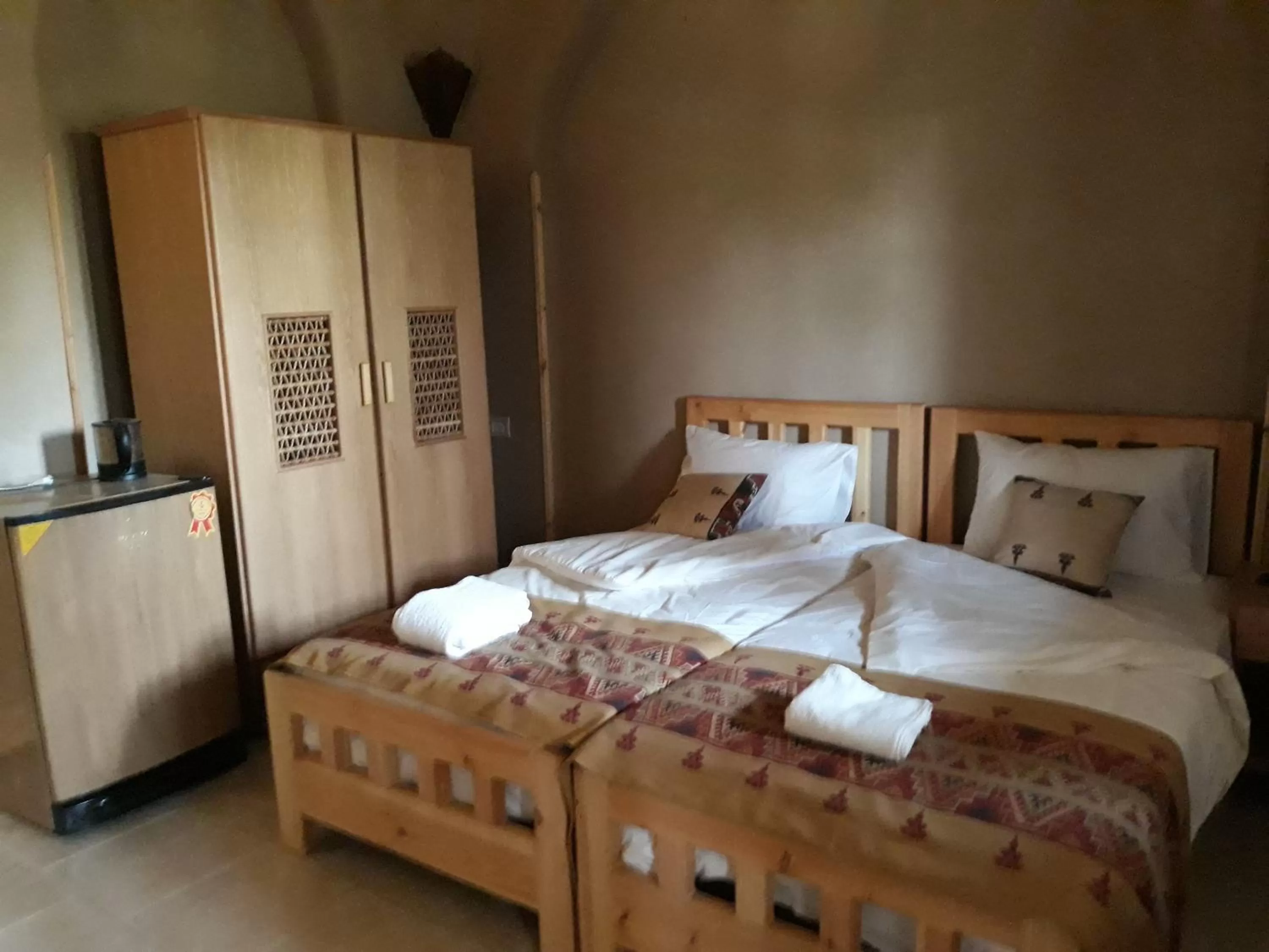 Bed in Embrace Hotel