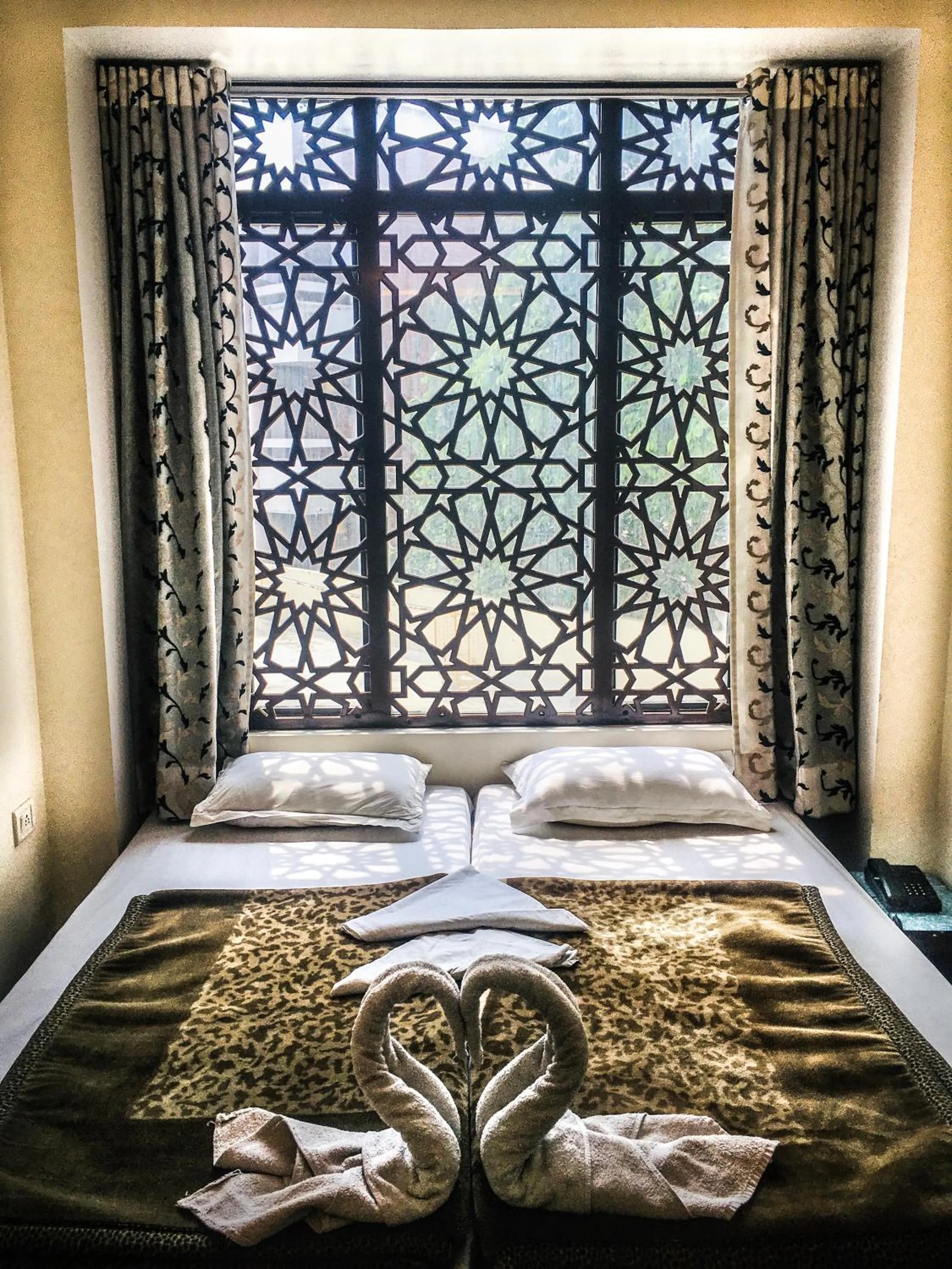 Bed in Krishna Palace - A Heritage Boutique Hotel