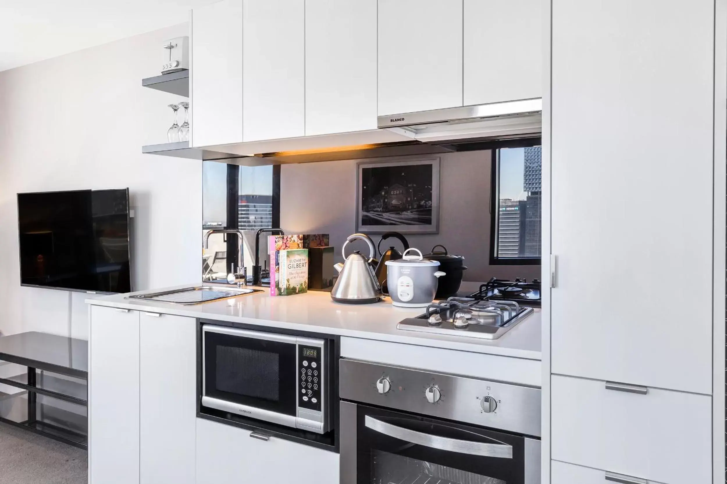 TV and multimedia, Kitchen/Kitchenette in Aura on Flinders Serviced Apartments