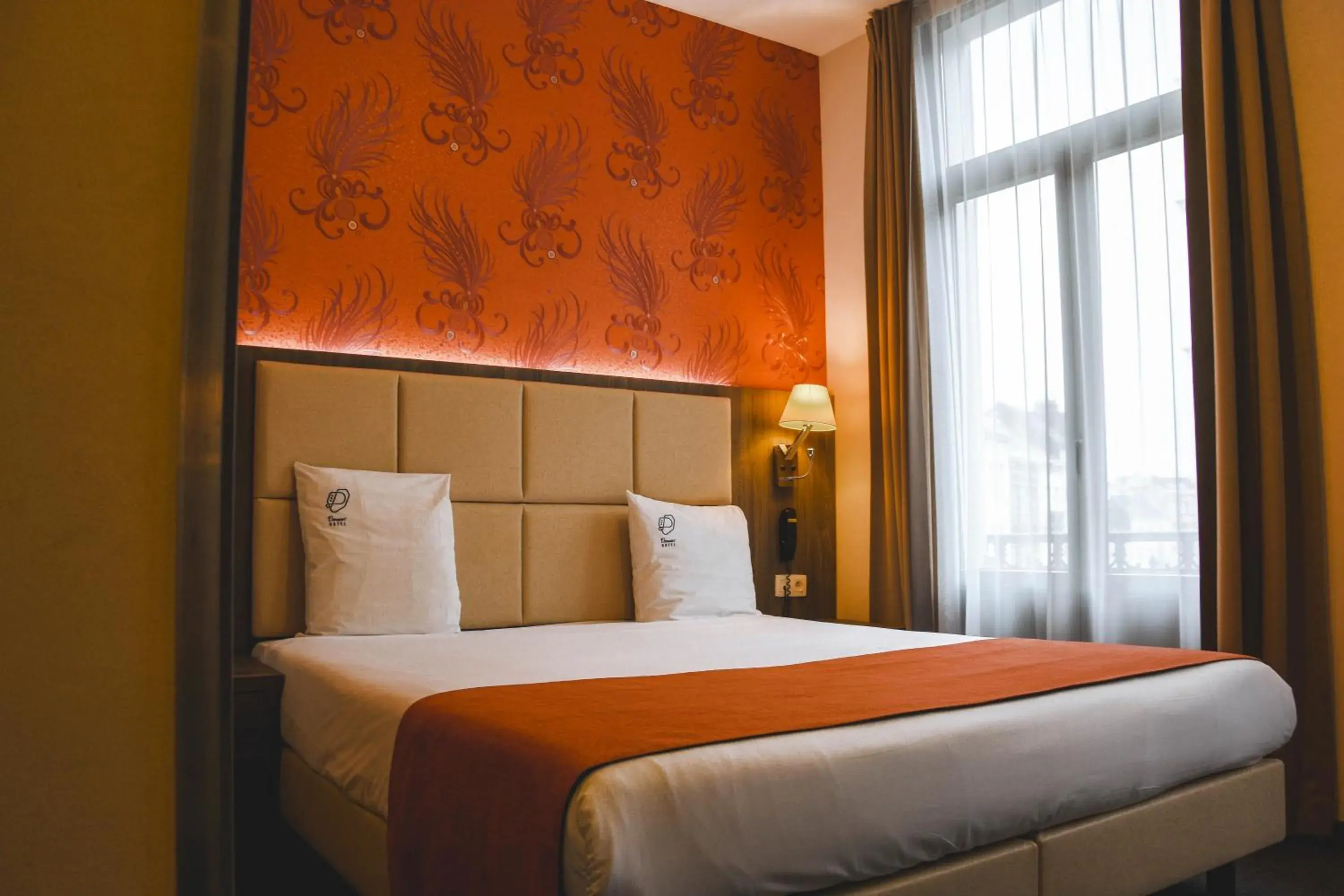 Bed in Dansaert Hotel