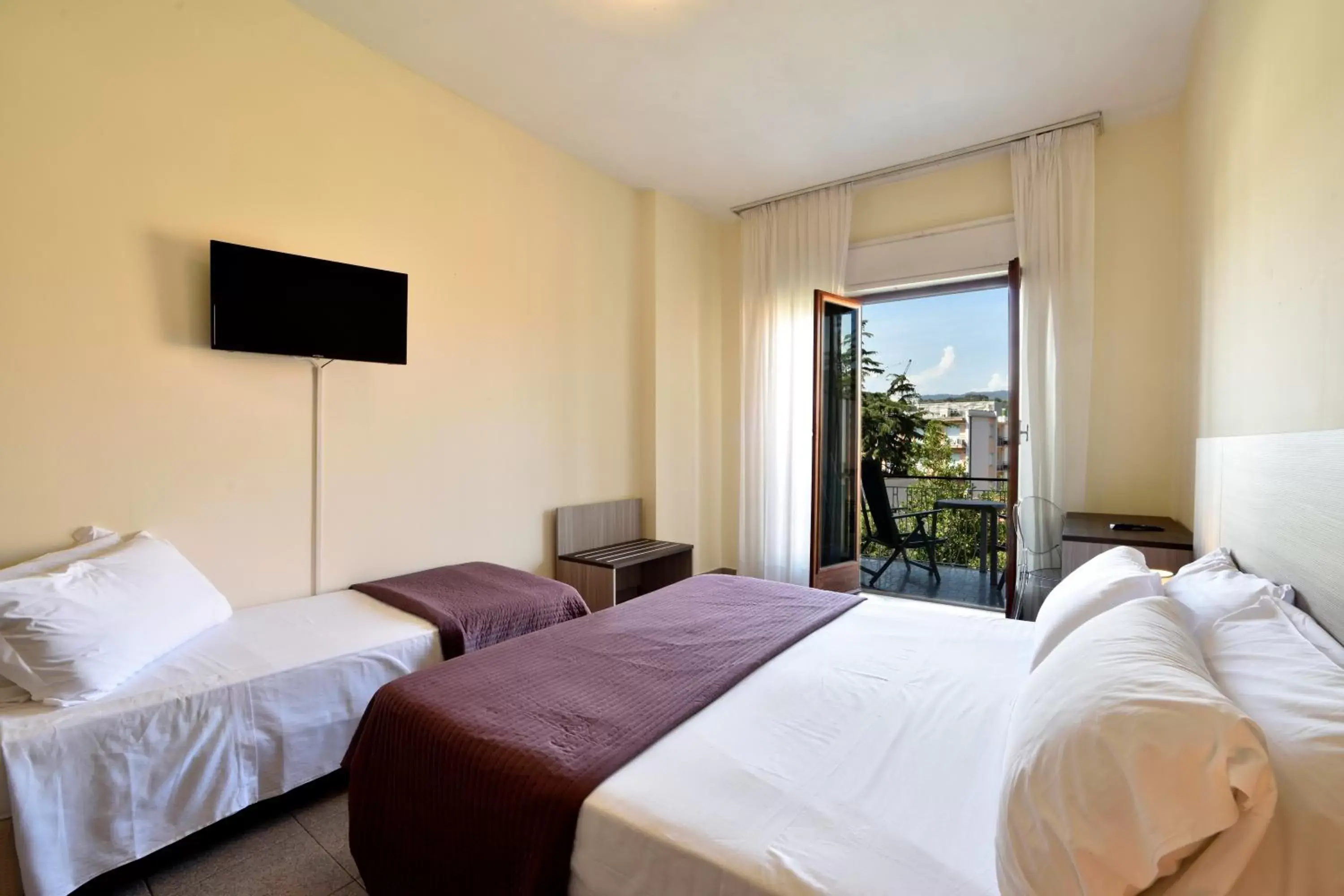 Bed in Hotel Diano Marina Mhotelsgroup