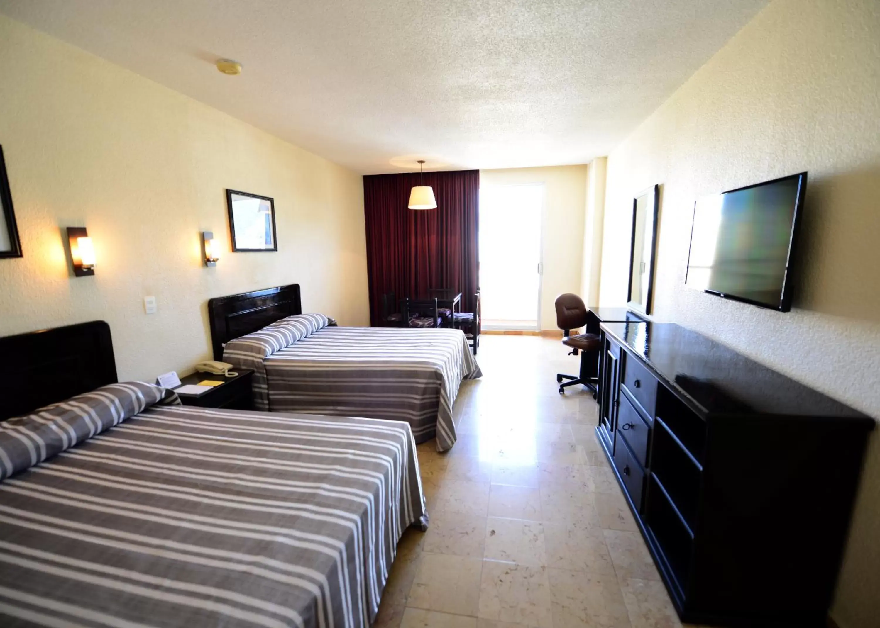 Photo of the whole room, Bed in Amarea Hotel Acapulco