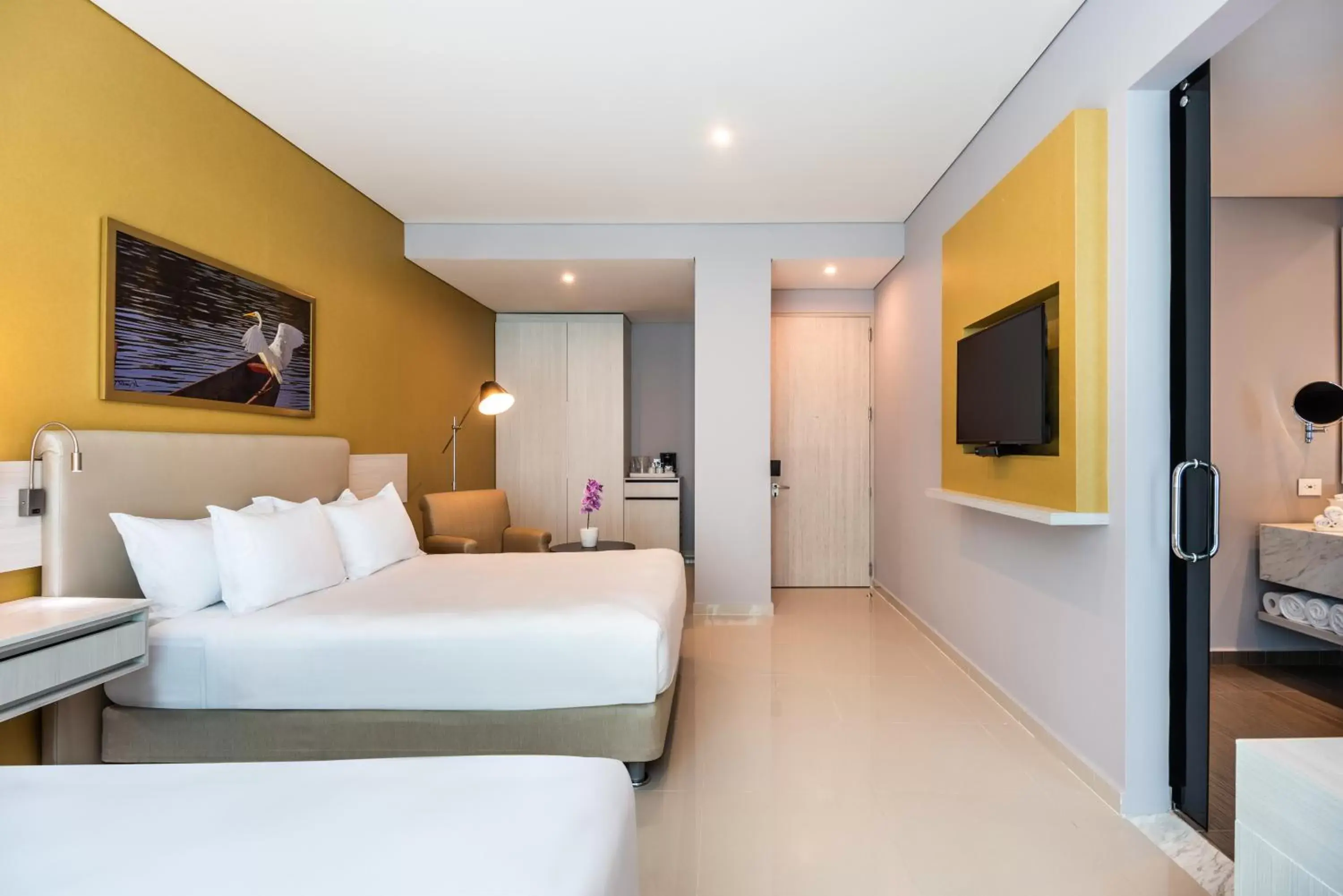 Bed in Crowne Plaza Barranquilla, an IHG Hotel