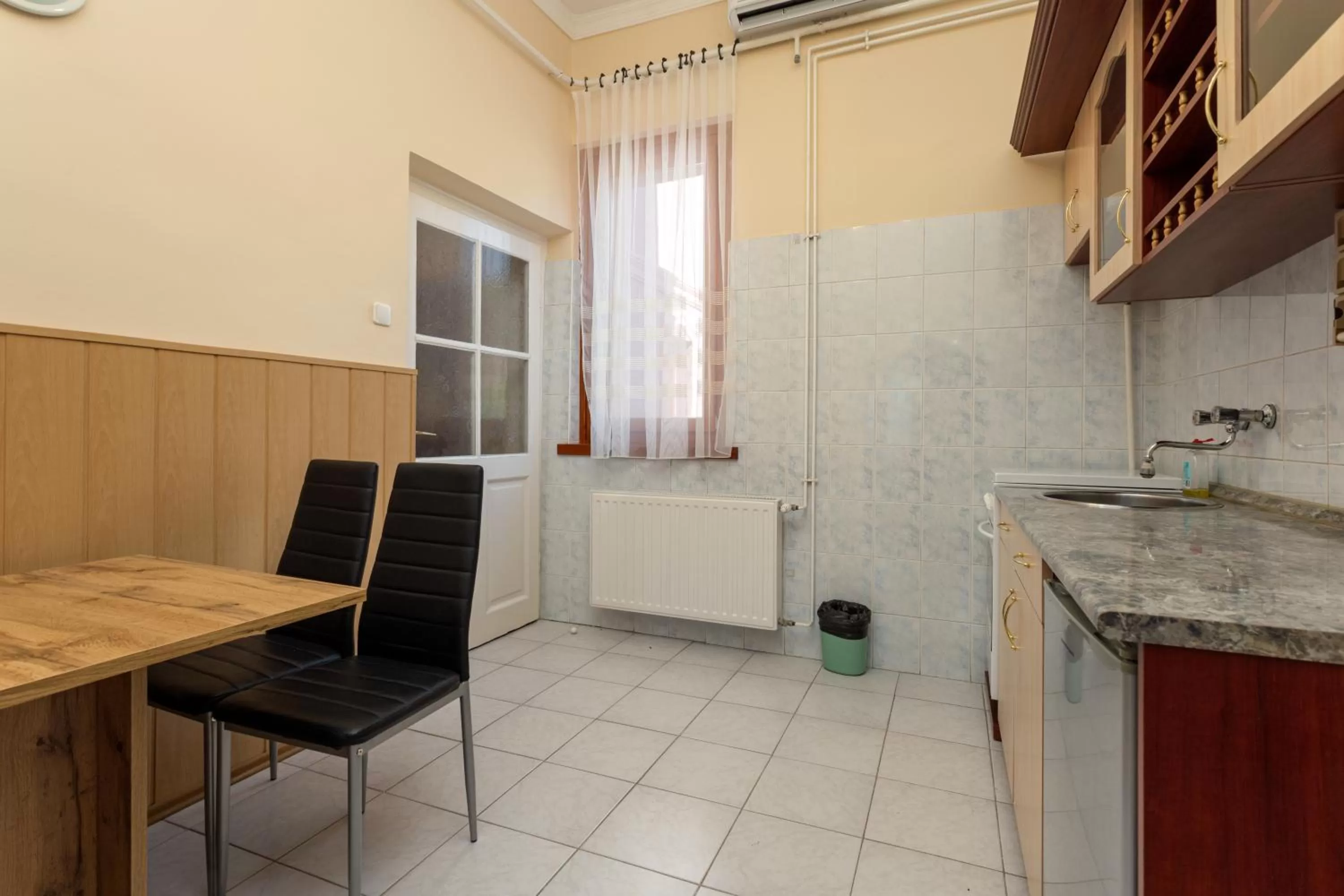 Kitchen or kitchenette in Illés Hotel