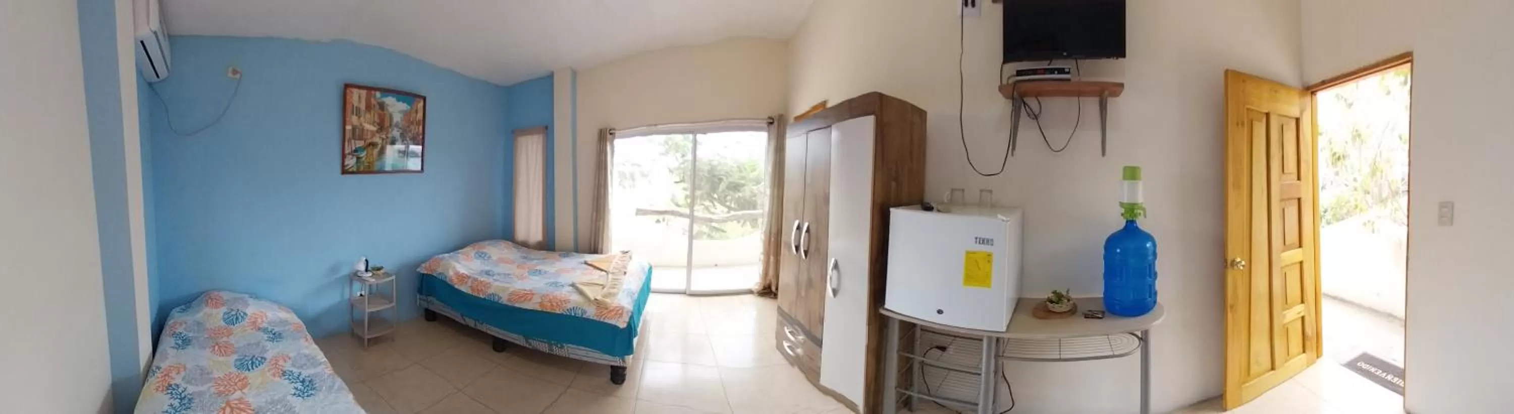 Bed in Hostal Cabañas Don Jorge