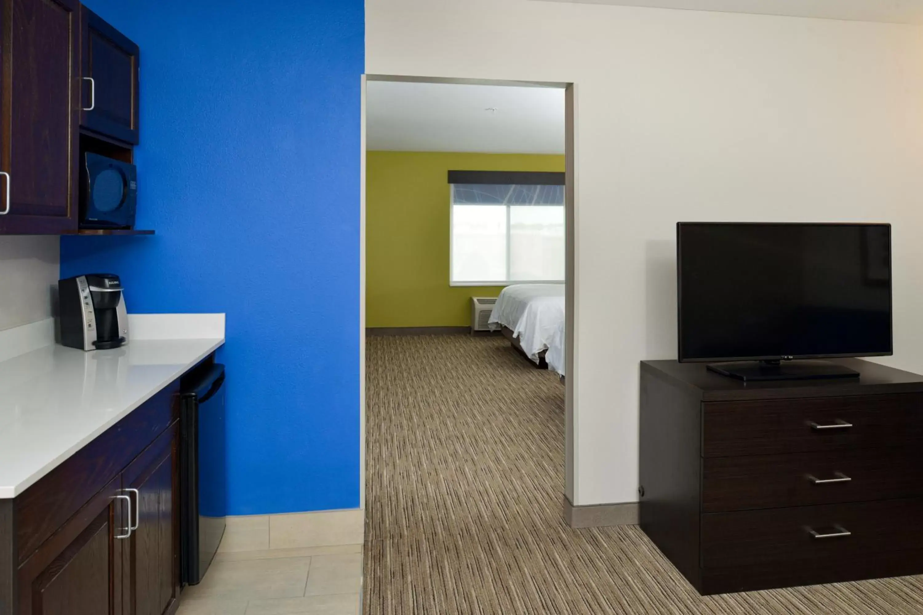 Photo of the whole room, TV/Entertainment Center in Holiday Inn Express & Suites Pueblo, an IHG Hotel